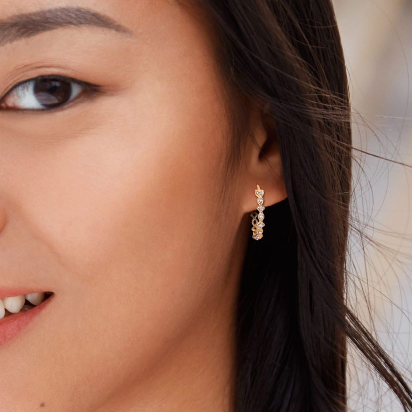 1/10 ct. t.w. Diamond Hoop Earrings in 10K Yellow Gold