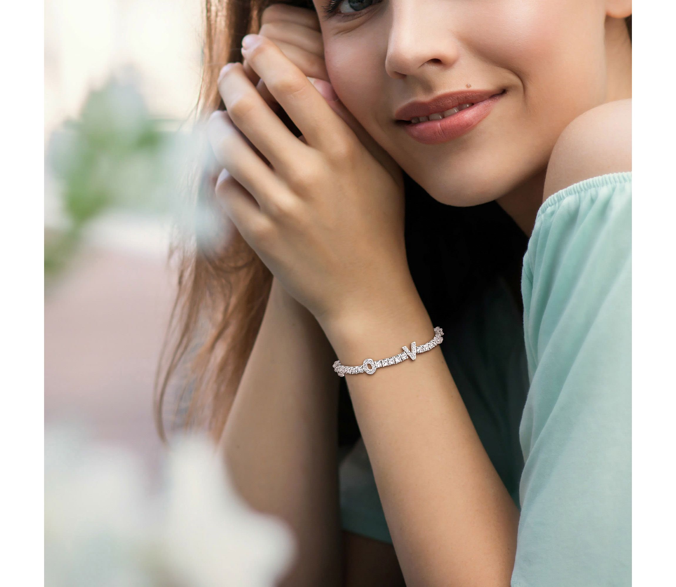 Lab Created Created White Sapphire "LOVE" Design Bracelet in Sterling Silver