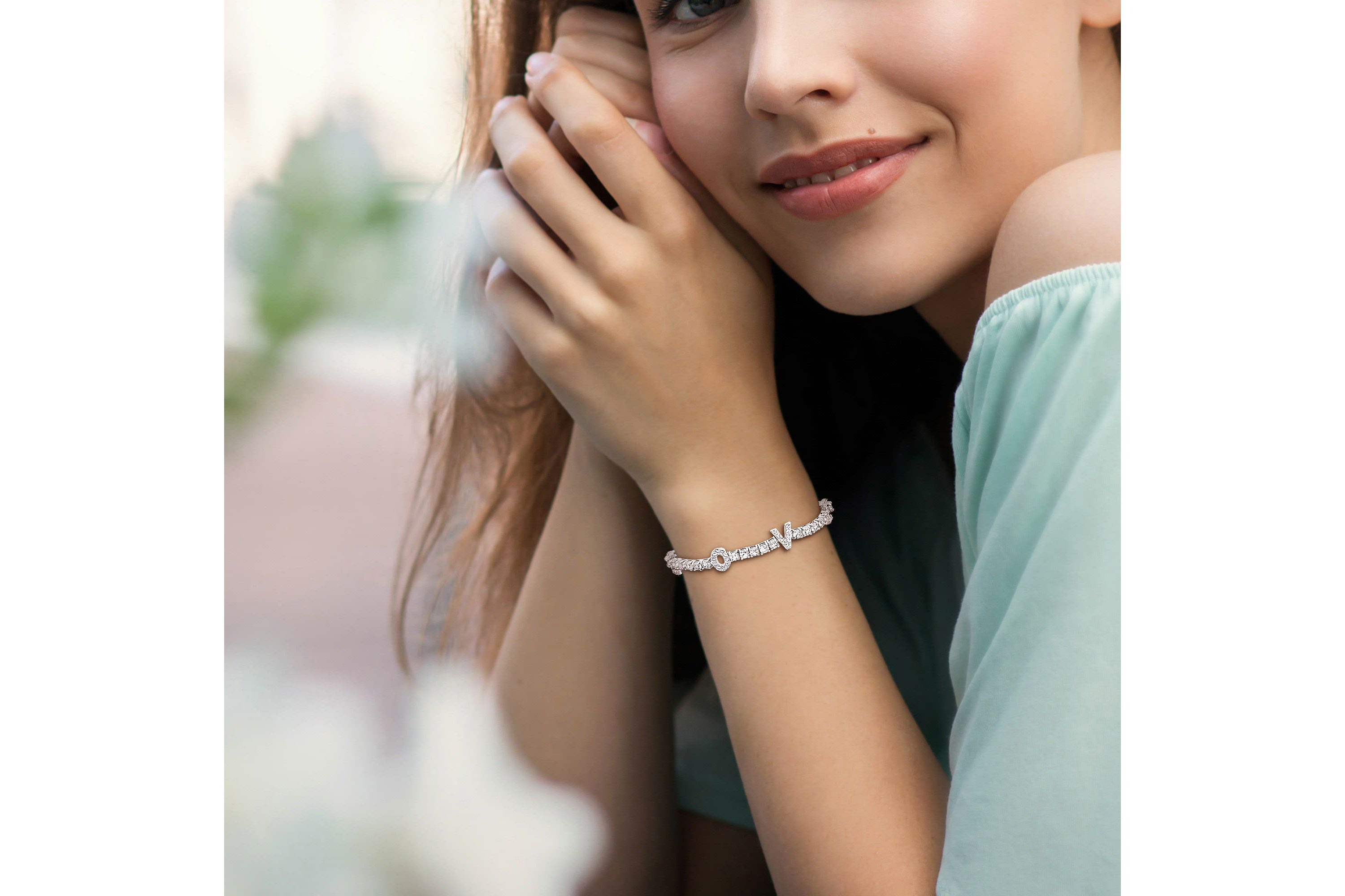 Lab Created Created White Sapphire "LOVE" Design Bracelet in Sterling Silver