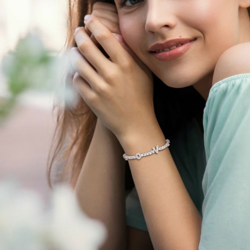 Lab Created Created White Sapphire "LOVE" Design Bracelet in Sterling Silver