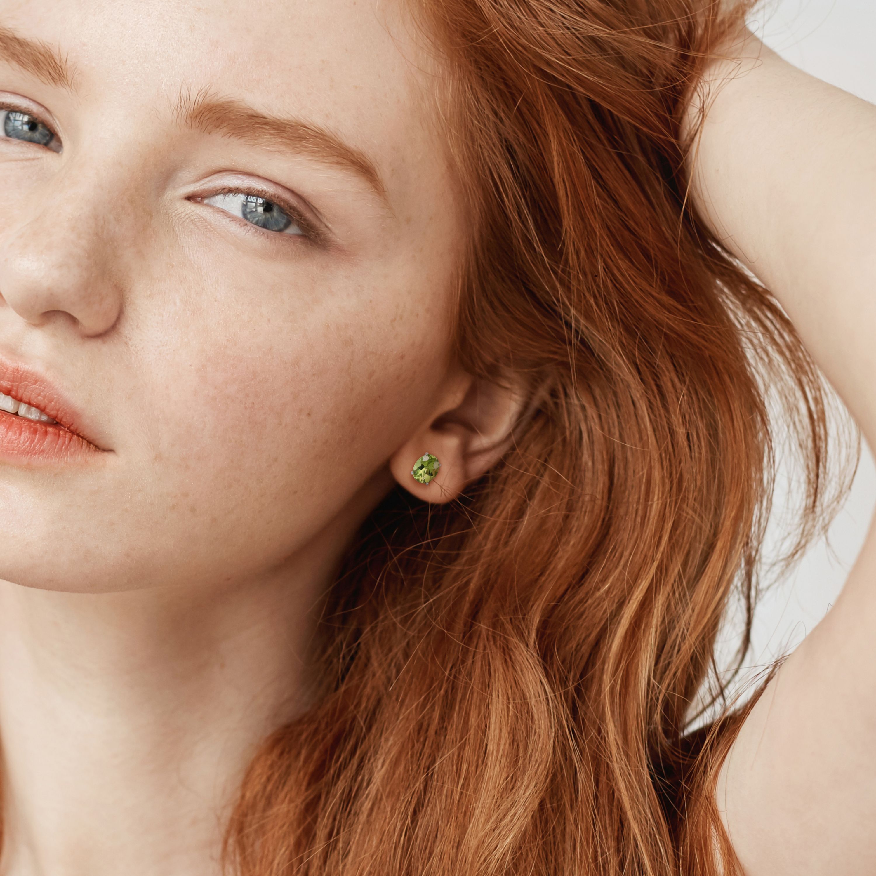Peridot Oval Stud Earrings in Sterling Silver