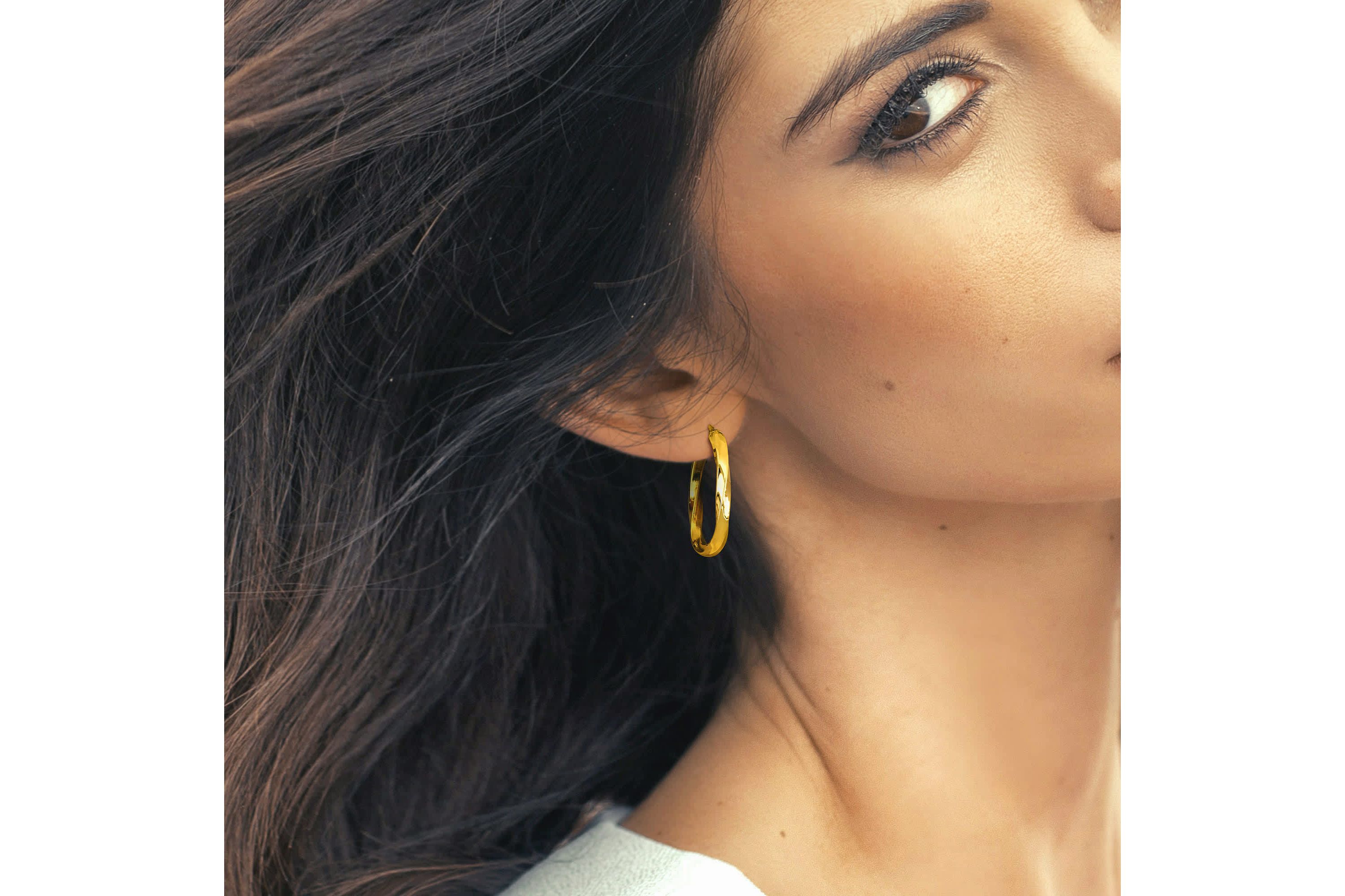 Twist Oval Hoop Earrings in Yellow Plated Sterling Silver