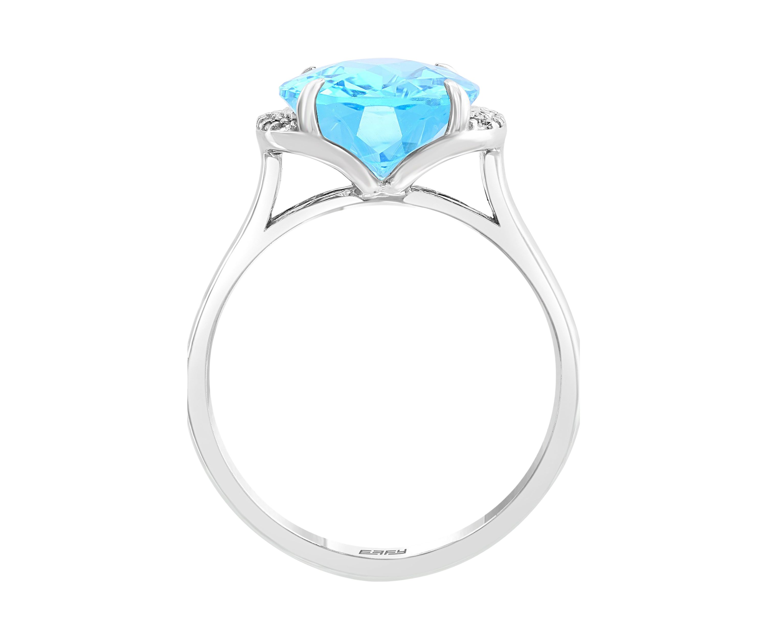 	  14K White Gold 1/10 ct. t.w. Diamond and 4.9 ct. t.w. Blue Topaz Ring  