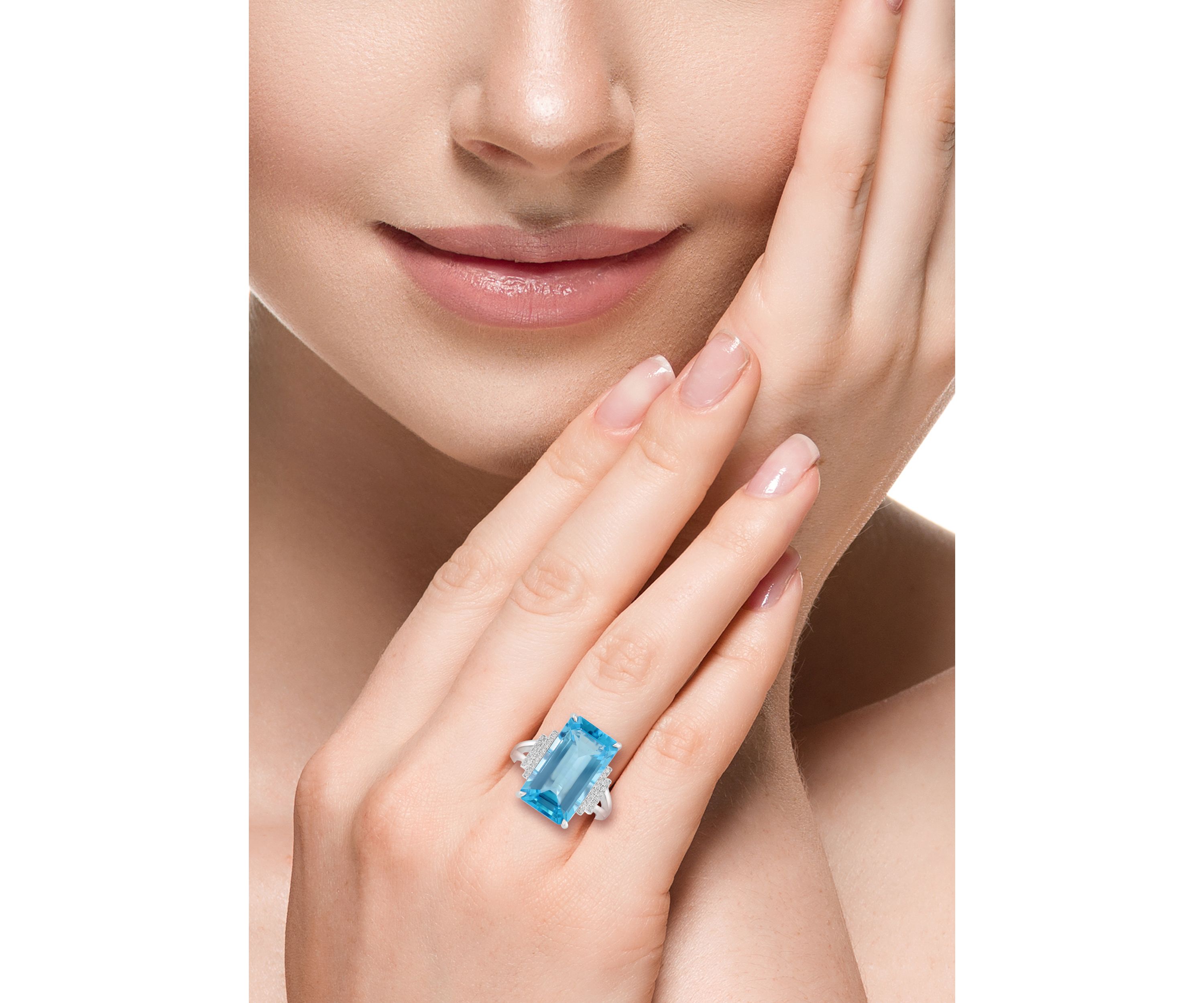 1/10 ct. t.w. Diamond and Sky Blue Topaz Ring in 14K White Gold