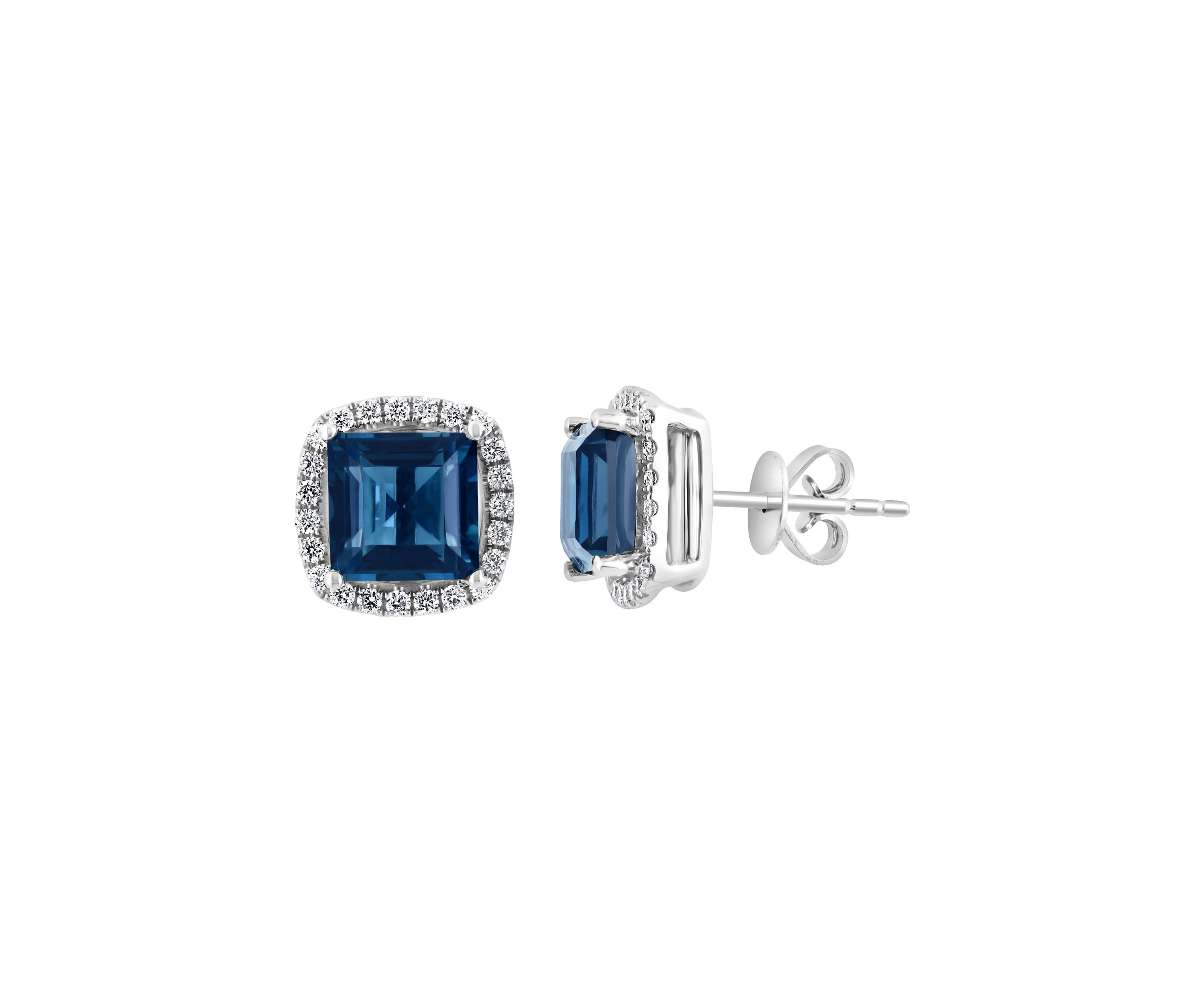 1/3 ct. t.w. Diamond and 4.85 ct. t.w. London Blue Topaz Earrings in 14K White Gold 