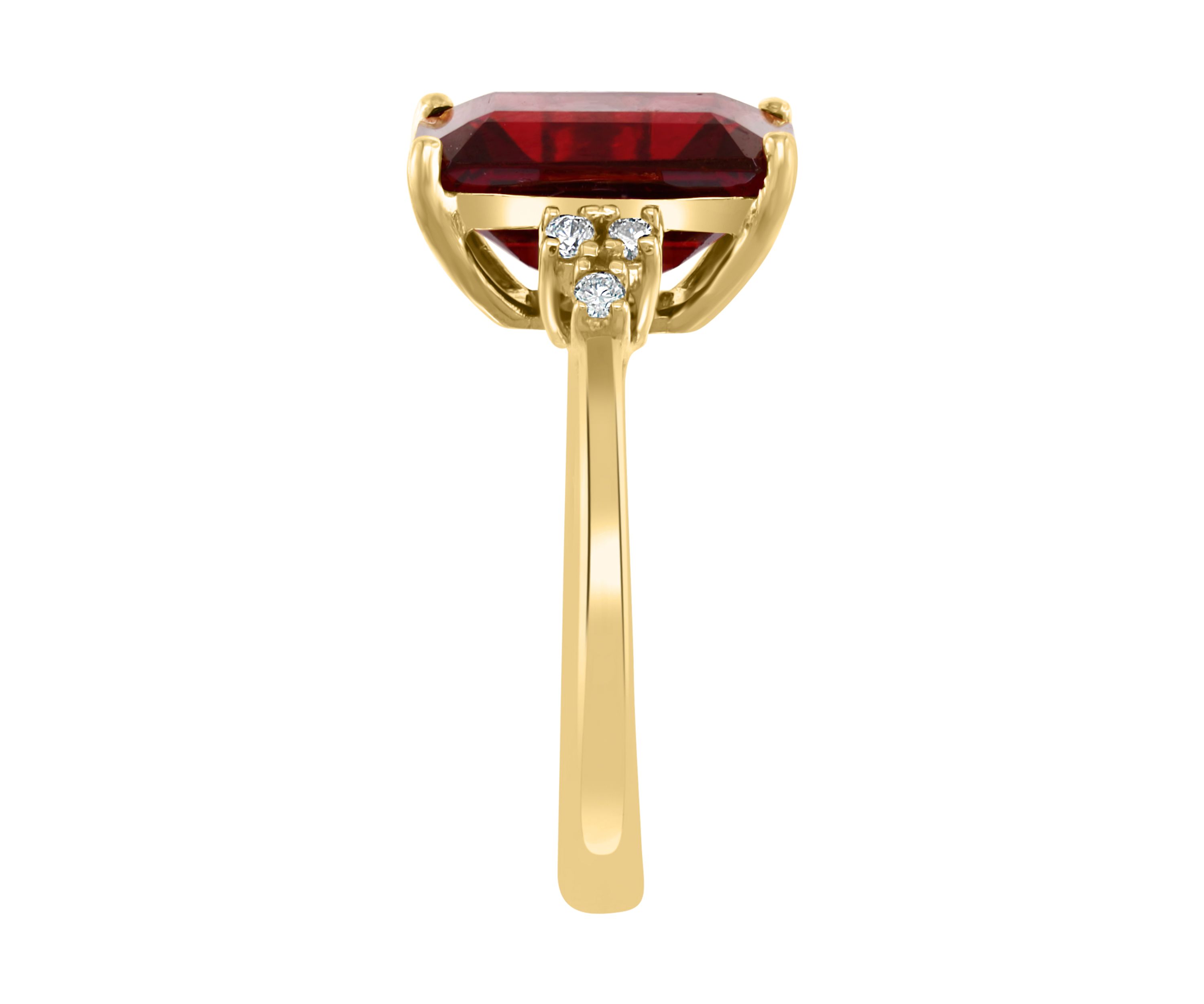 1/8 ct. t.w. Diamond and 6.65 ct. t.w. Garnet Ring in 14K Yellow Gold 