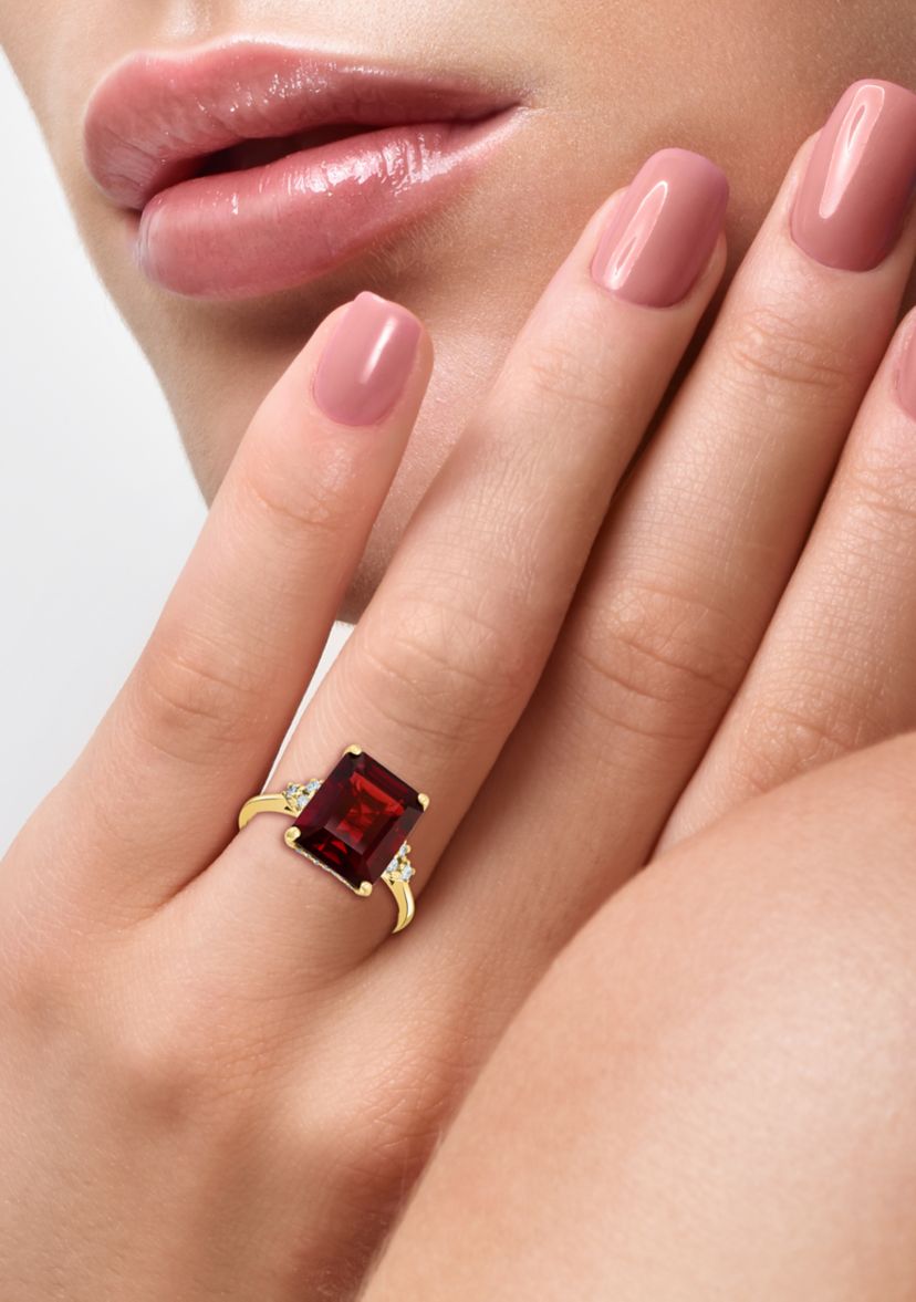 1/8 ct. t.w. Diamond and 6.65 ct. t.w. Garnet Ring in 14K Yellow Gold 
