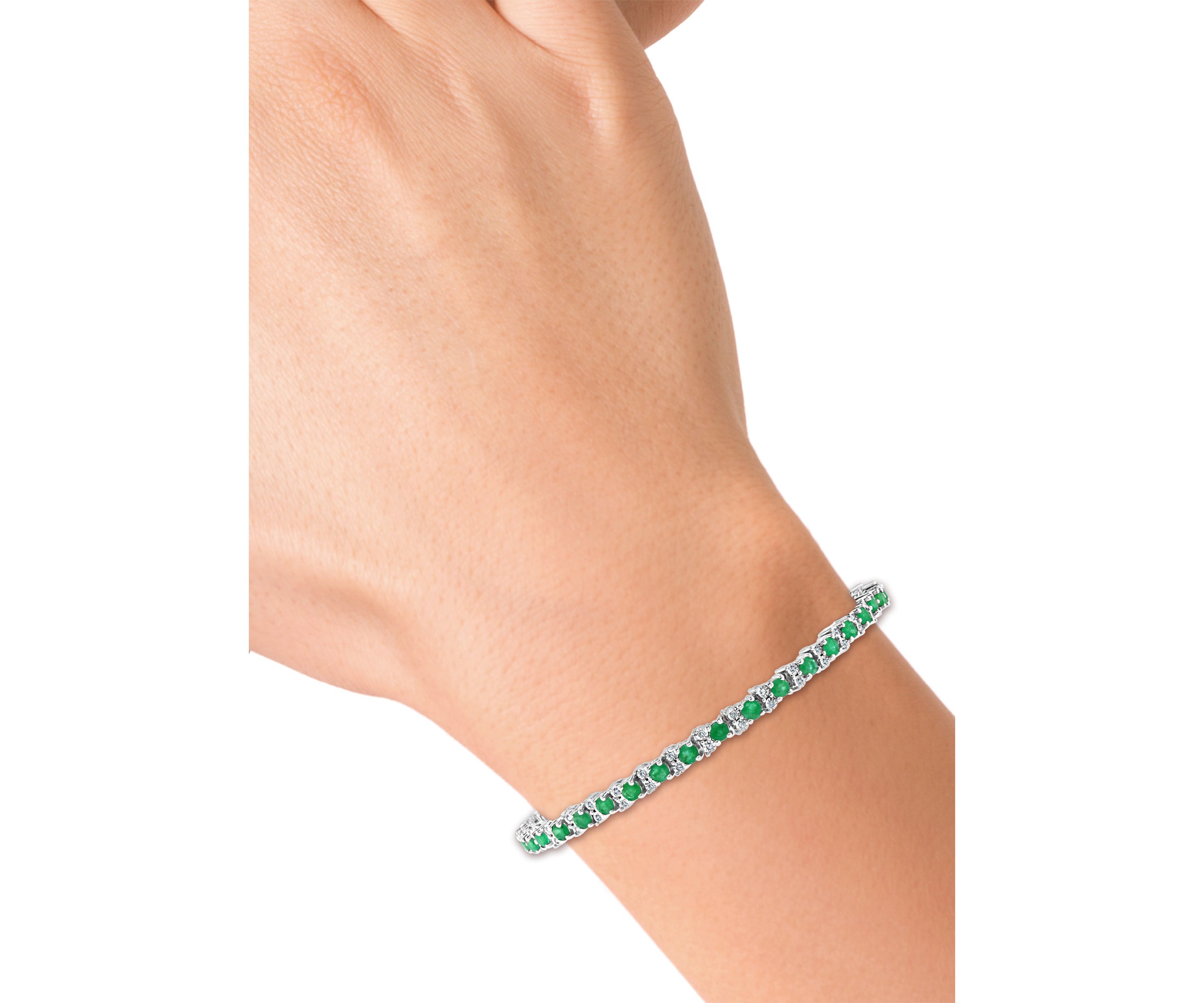 2.99 ct. t.w. Emerald and 1/5 ct. t.w. Diamond Tennis Bracelet in Sterling Silver