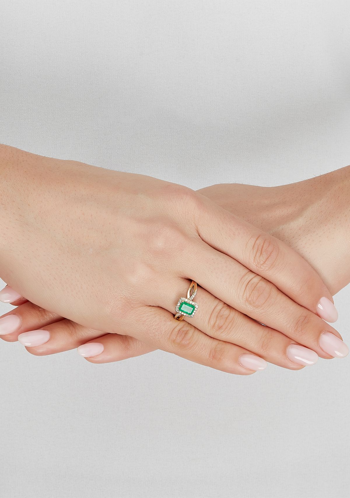 1/8 ct. t.w. Diamond and Emerald Ring in 10K Yellow Gold