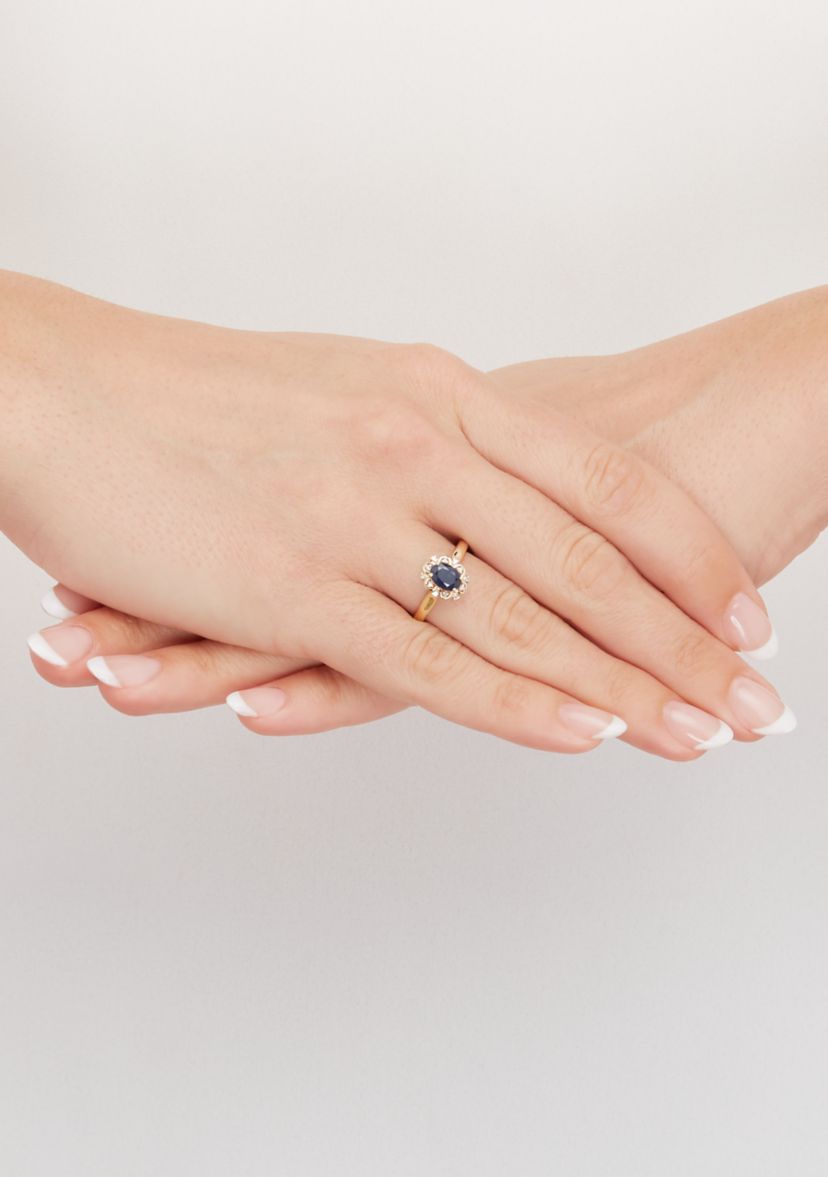 1/10 ct. t.w. Sapphire and Diamond Ring in 10K Yellow Gold