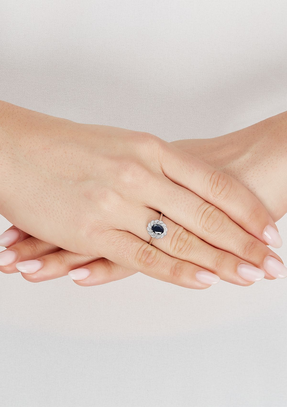 1/10 ct. t.w. Diamond and Sapphire Ring in 14K White Gold