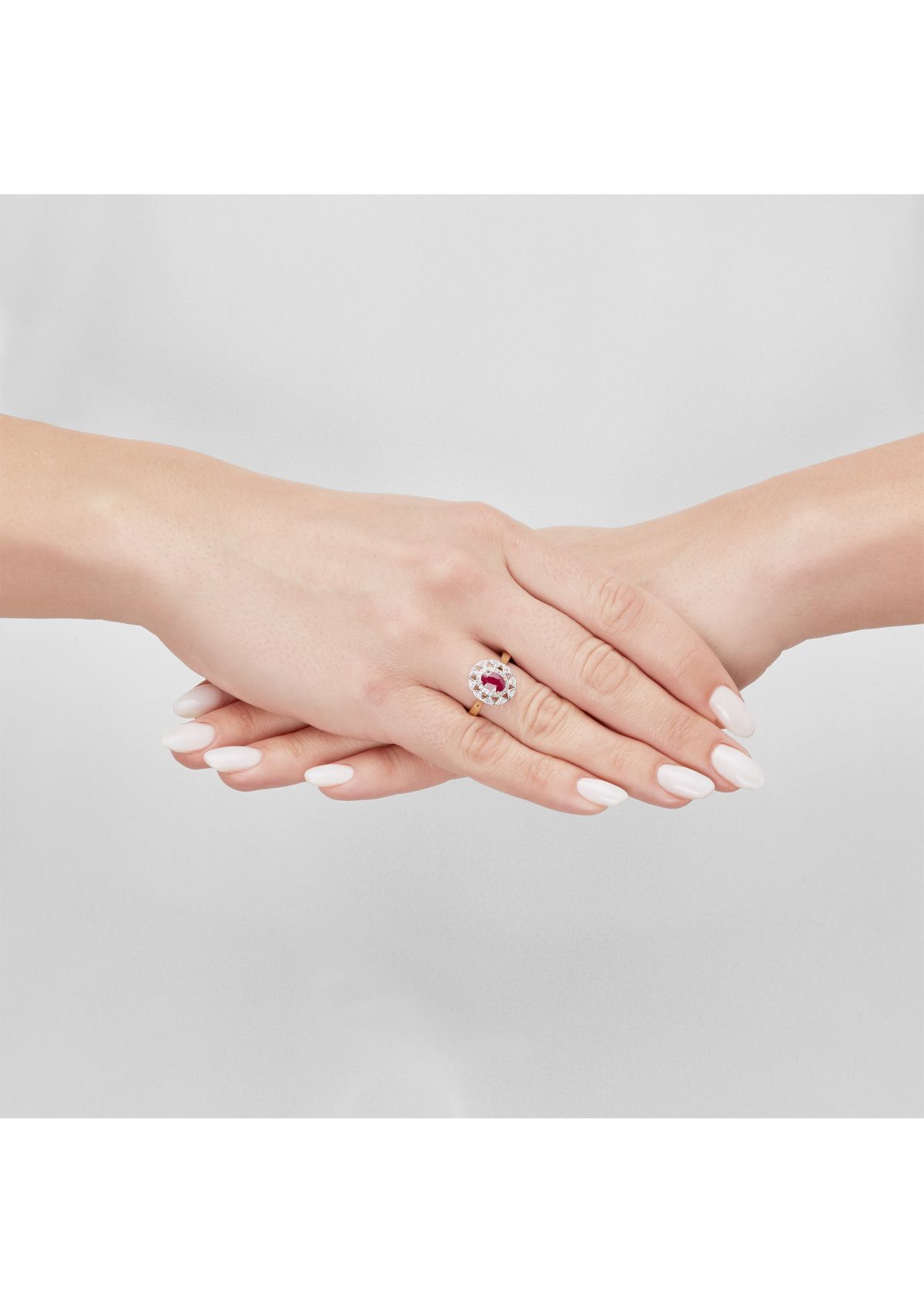 1/10 ct. t.w. Diamond and Ruby Oval Ring in 10K Yellow Gold