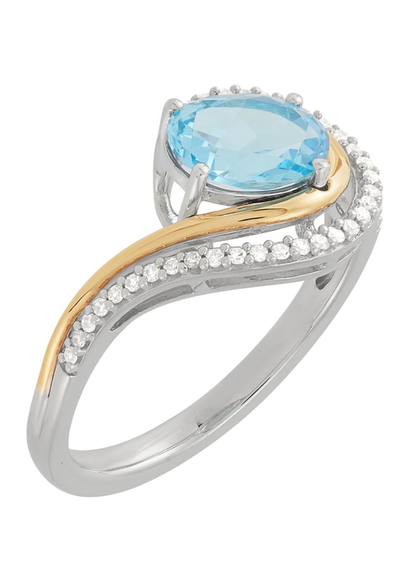 1/8 ct. t.w. Diamond and Swiss Blue Topaz Ring in Two Tone Metal