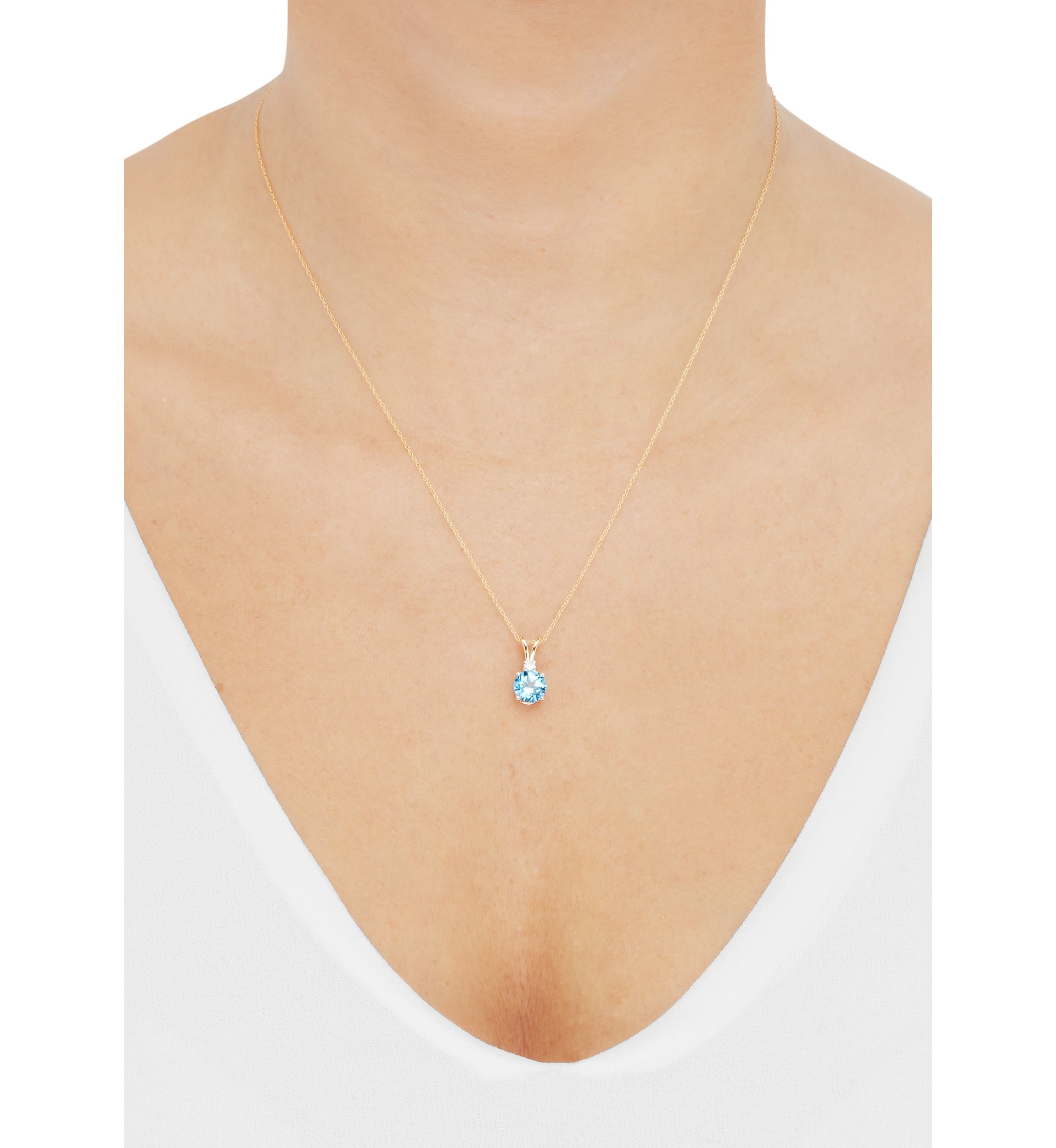1/10 ct. t.w. Diamond and Swiss Blue Topaz Pendant Necklace with 18" Rope Chain in 10K Yellow Gold
