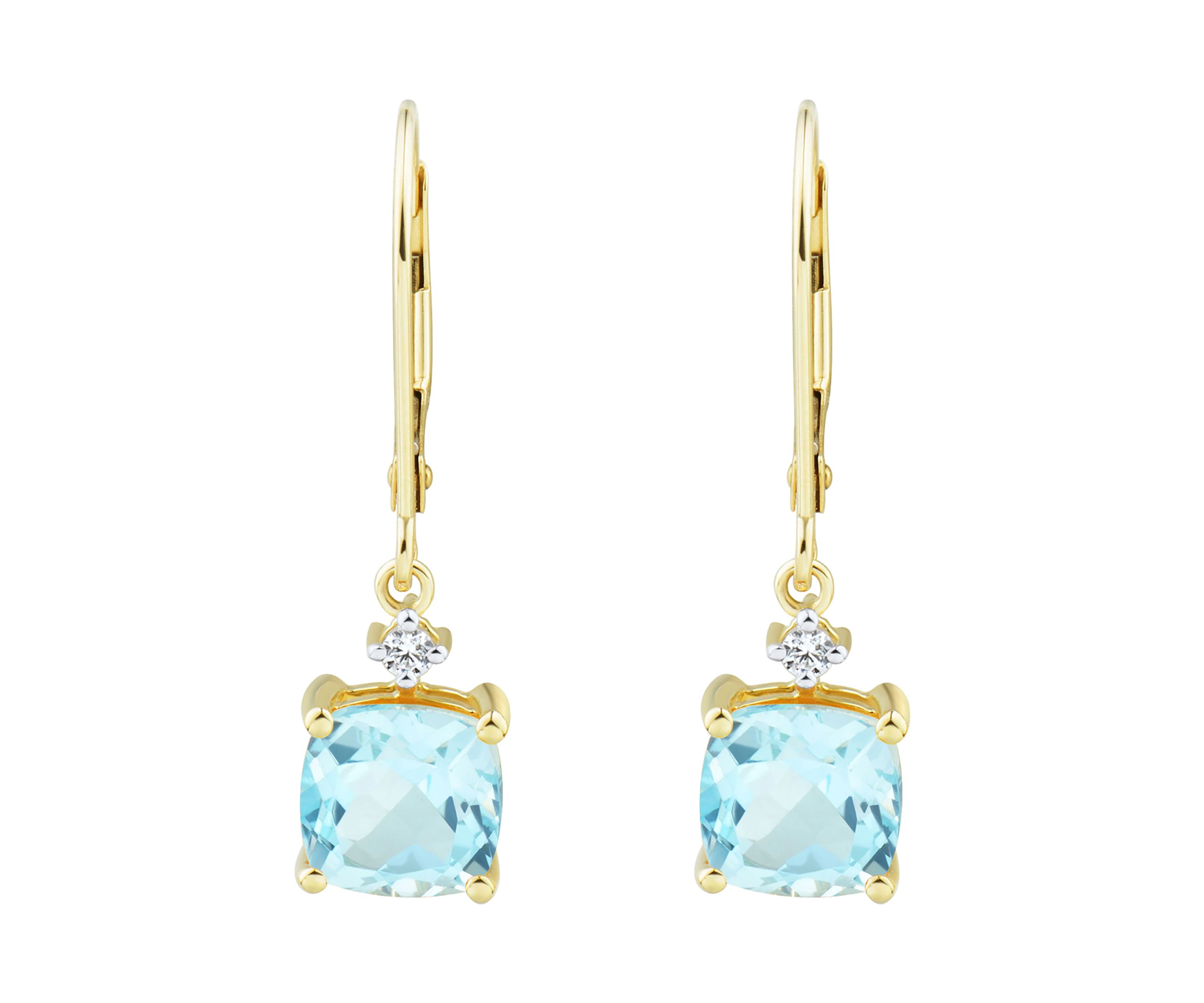 1/10 ct. t.w. Diamond and Sky Blue Topaz Earrings in 10K Yellow Gold