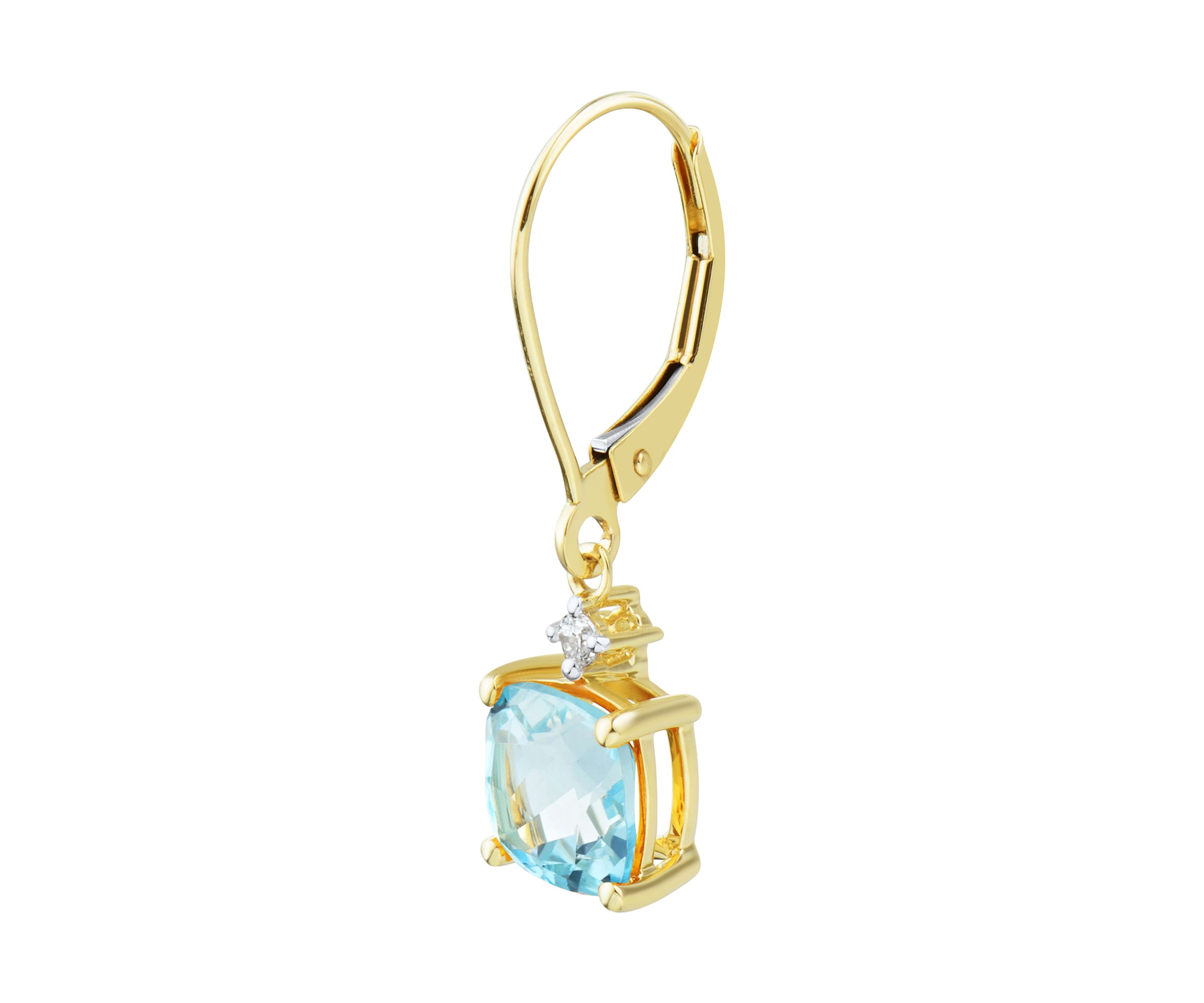 1/10 ct. t.w. Diamond and Sky Blue Topaz Earrings in 10K Yellow Gold