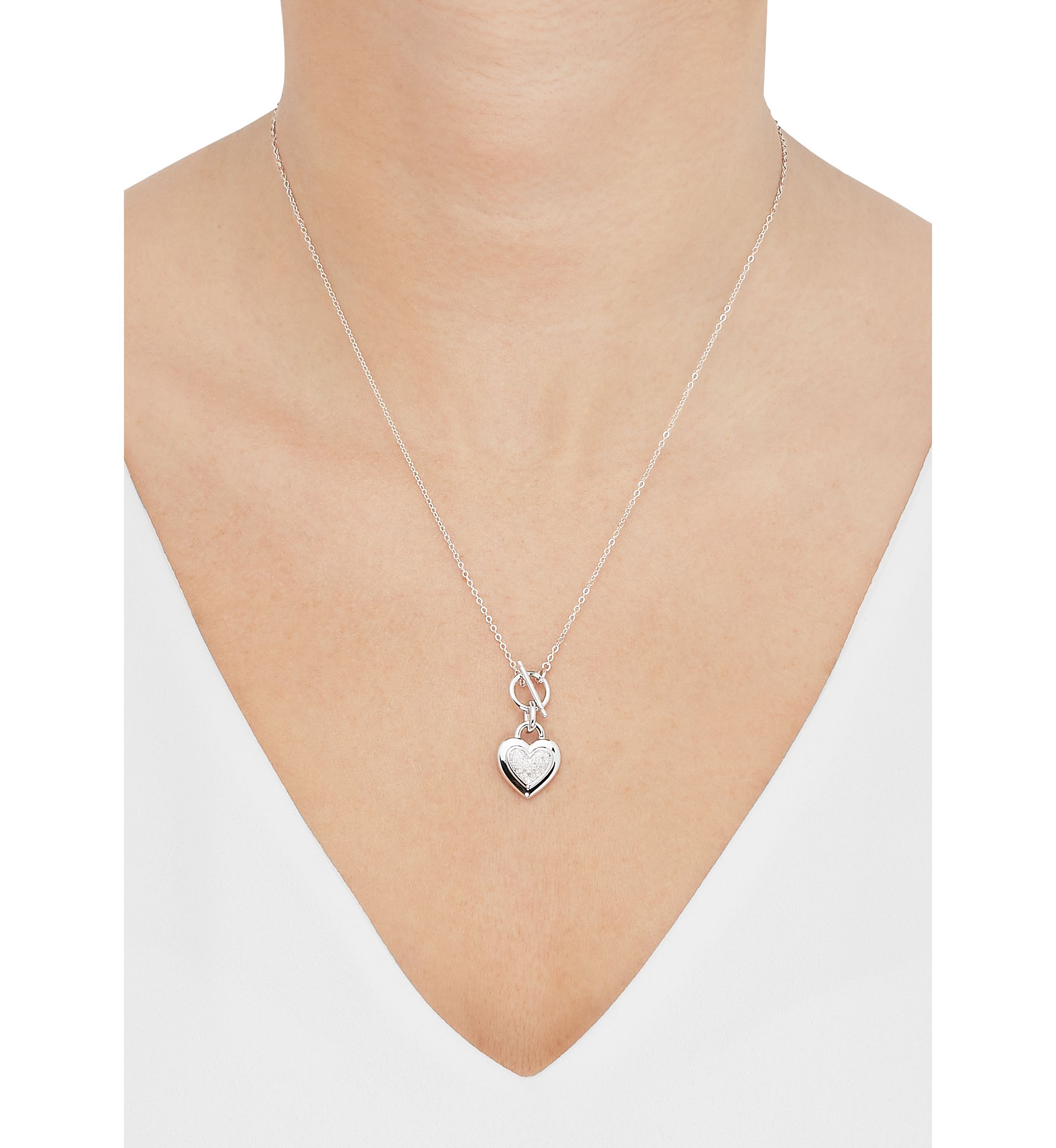 1/10 ct. t.w. Diamond Interlock Heart Necklace in Sterling Silver