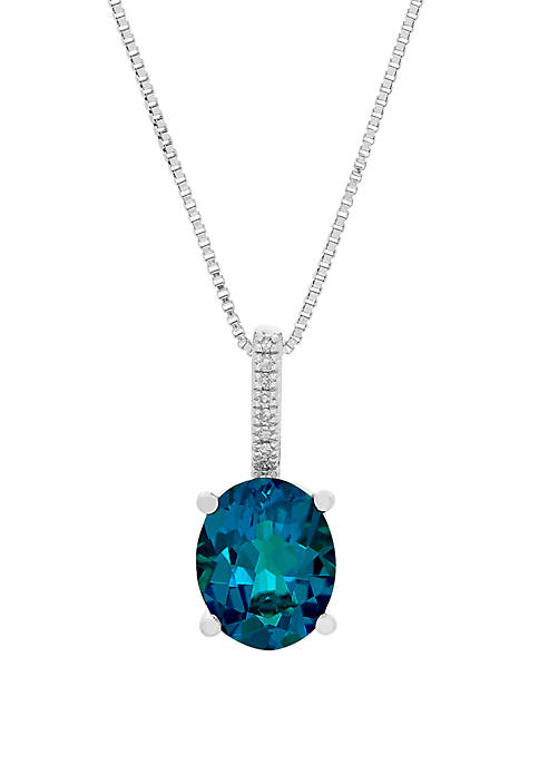 3.3 ct. t.w. London Blue Topaz and 1/10 ct. t.w. Diamond Oval Pendant Necklace in Sterling Silver