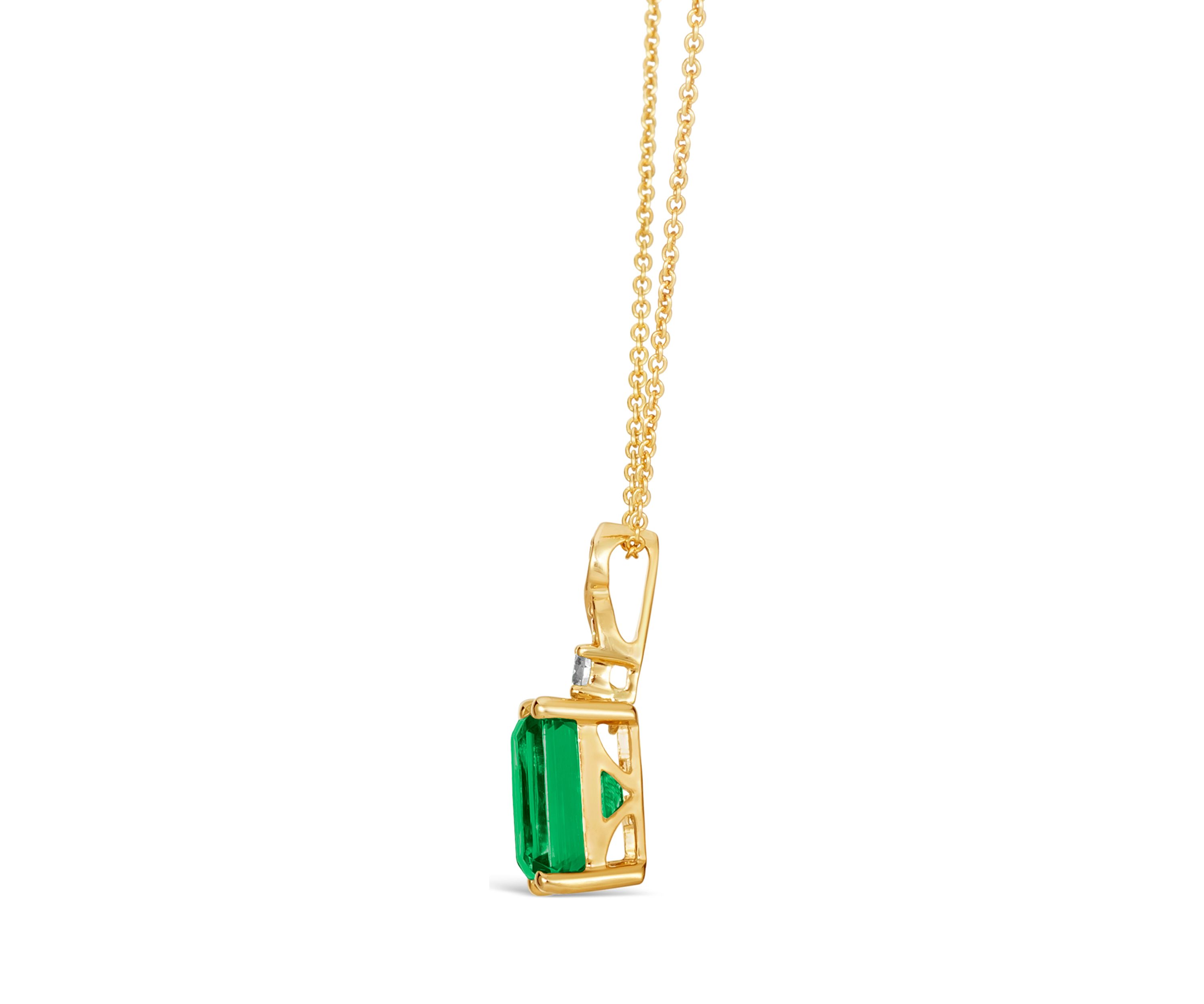  1/10 ct. t.w. Nude Diamond and 2 ct. t.w. Emerald Pendant Necklace in 14K Yellow Gold 