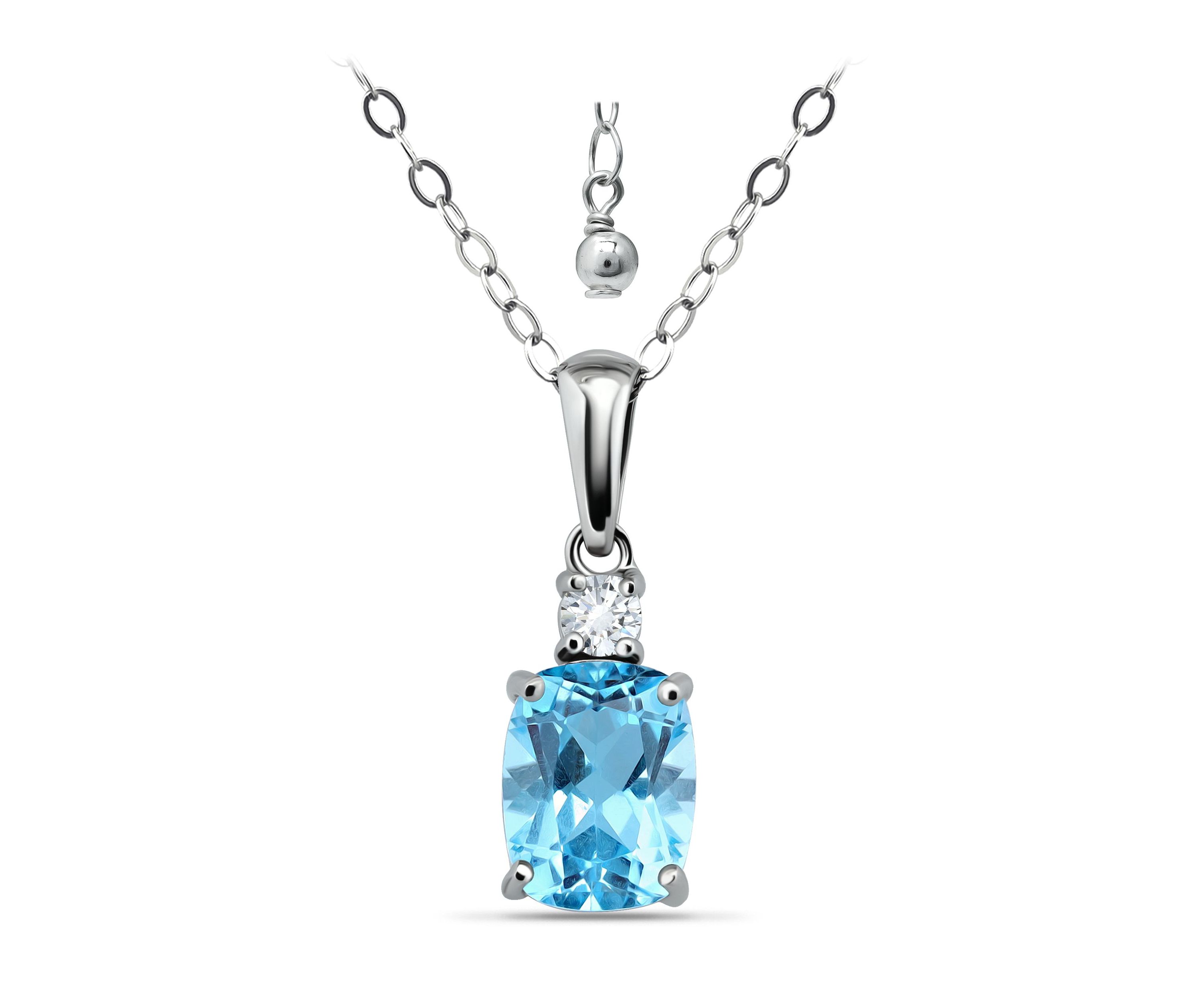 2 1/5 Cttw 9X7 Octagon Swiss Blue Topaz & 3mm Round White Topaz Pendant w/Bale, Sterling Silver, DS