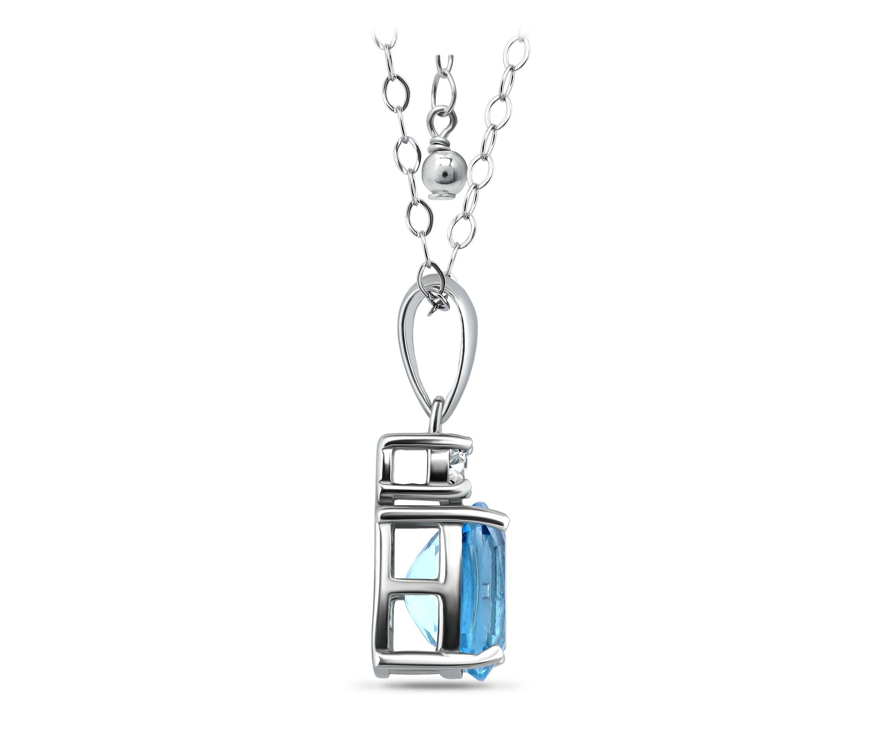 2 1/5 Cttw 9X7 Octagon Swiss Blue Topaz & 3mm Round White Topaz Pendant w/Bale, Sterling Silver, DS