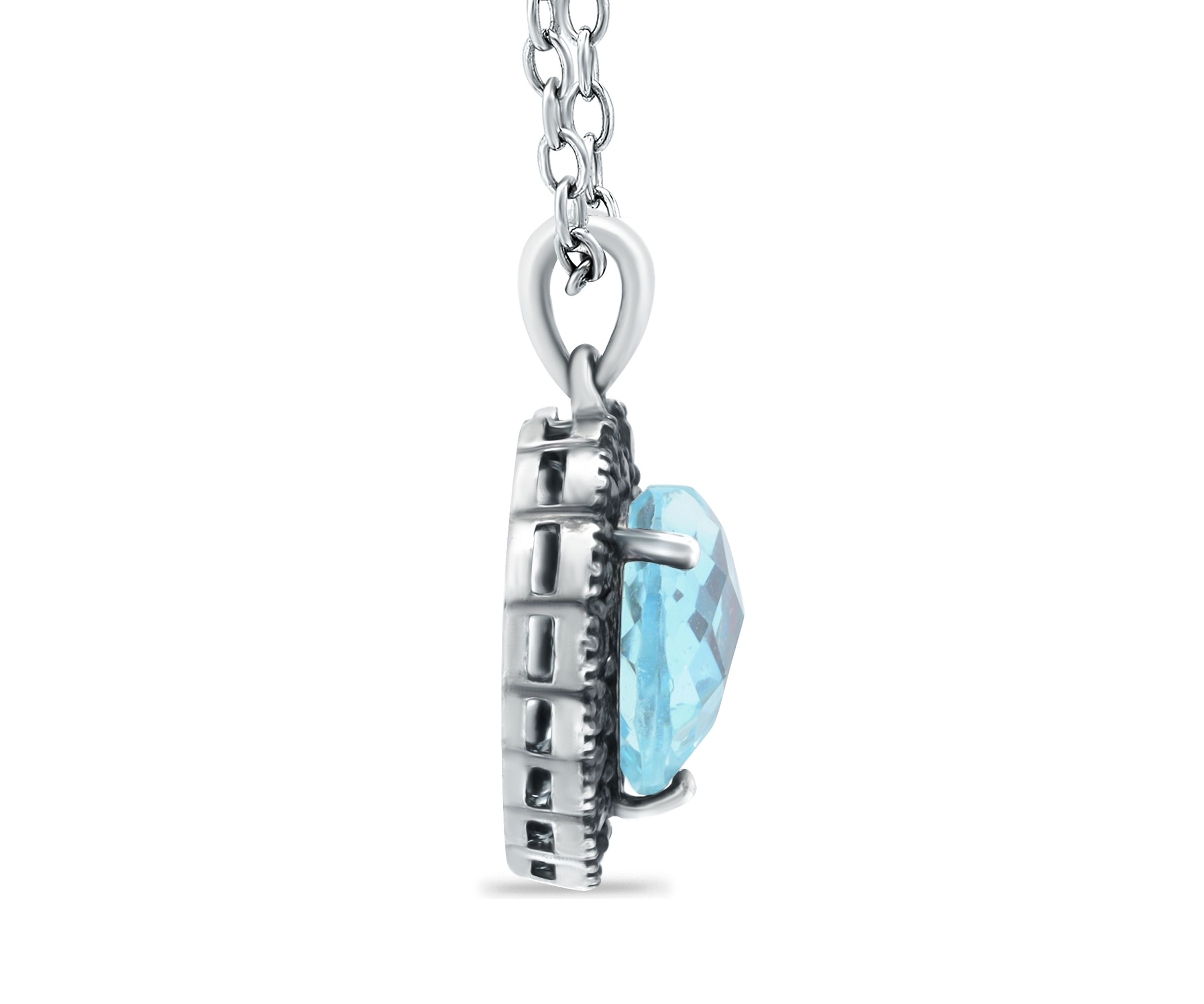 4.5 ct. t.w. Blue Topaz and 1 ct. t.w. Black Spinel Heart Pendant Necklace in Sterling Silver