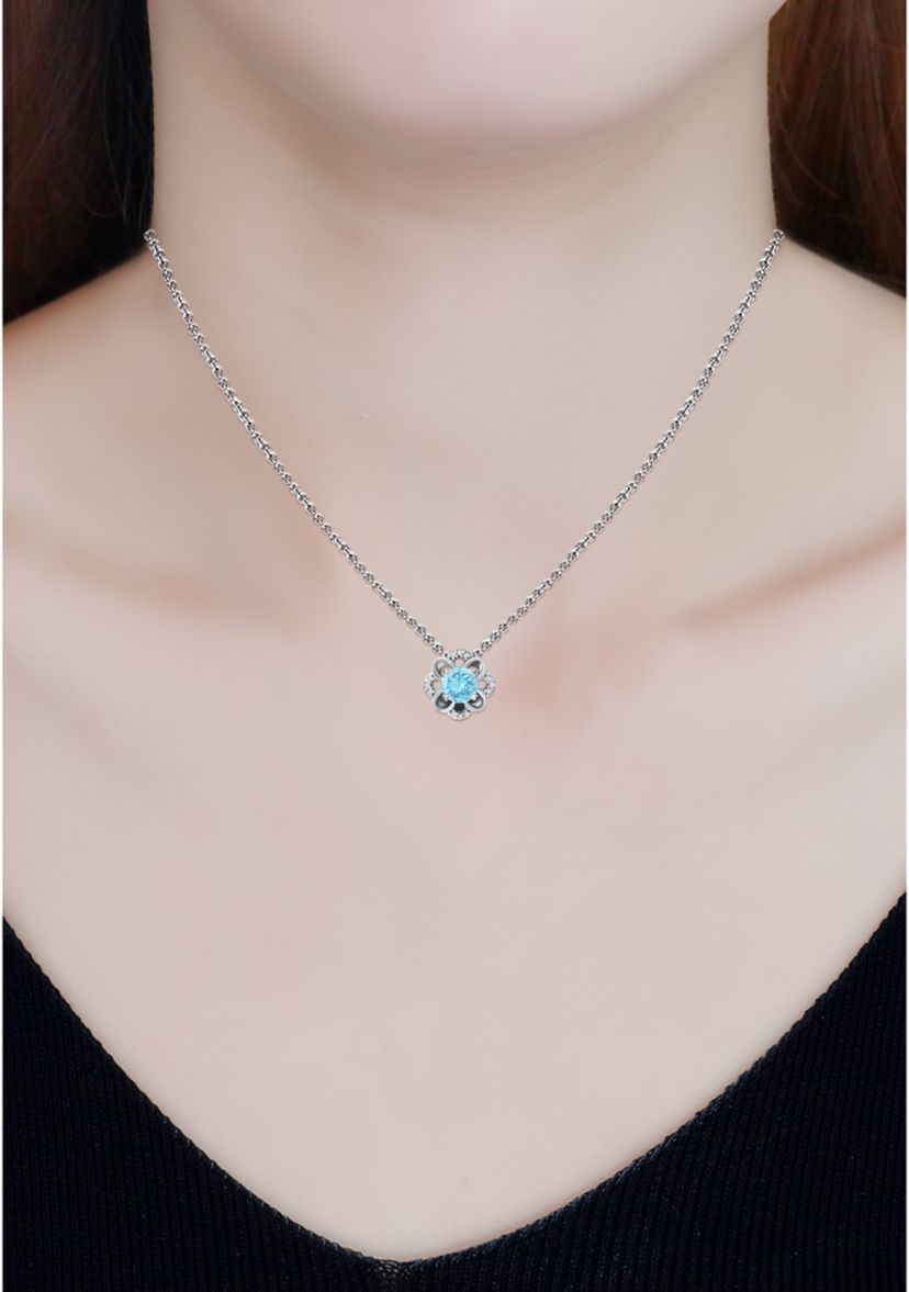 7/8 ct. t.w. Blue and White Topaz Flower Necklace, Sterling Silver