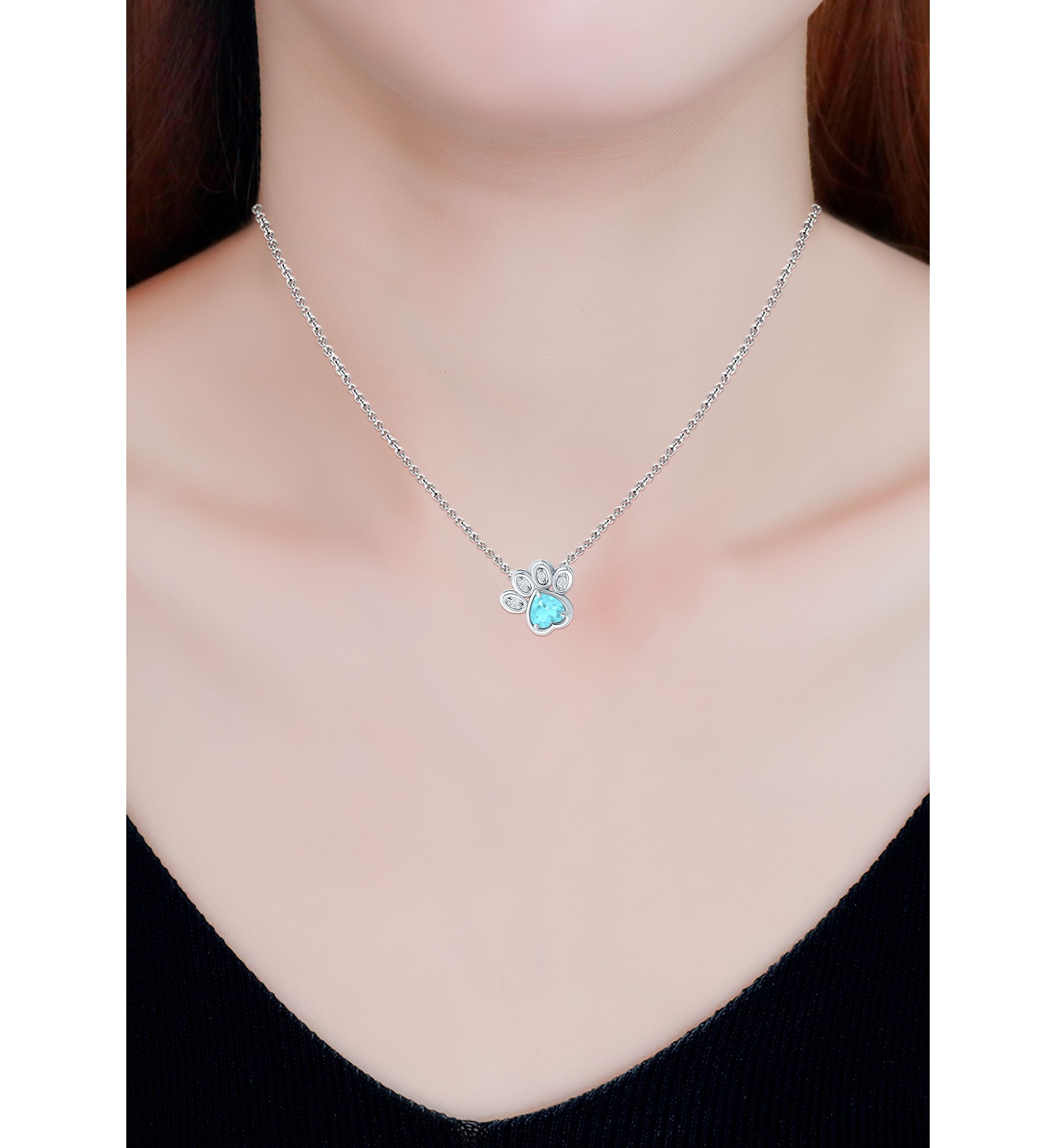 3/4 ct. t.w. Blue and White Topaz Paw Necklace, Sterling Silver