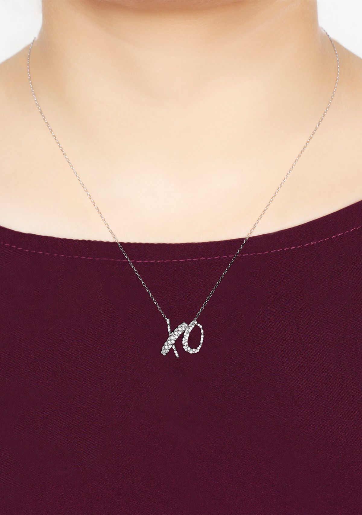 1/5 ct. t.w. Round White Diamond XO Pendant Necklace in Sterling SIlver