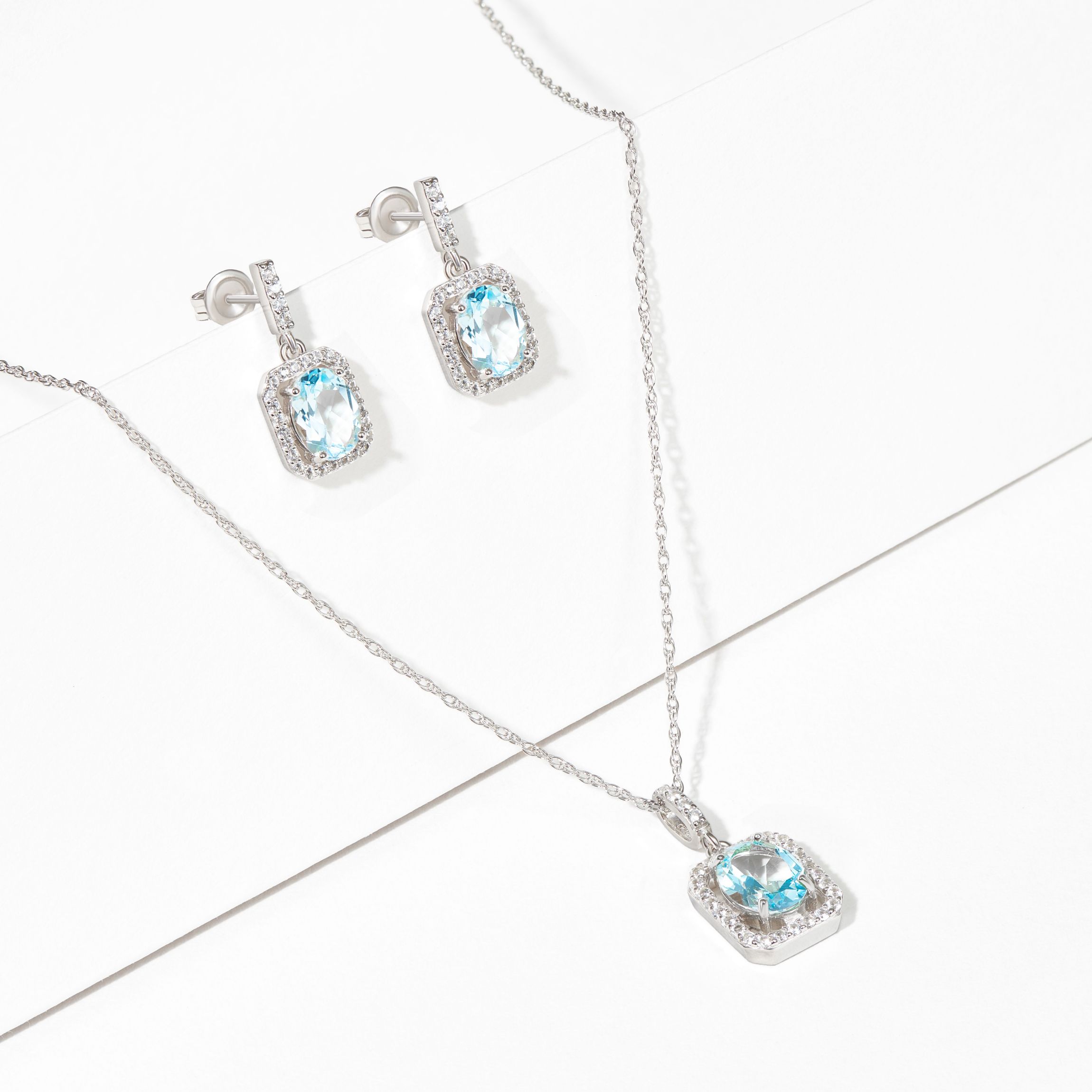 Created Blue and White Sapphire Halo Necklace and Earring Set in Sterling Silver