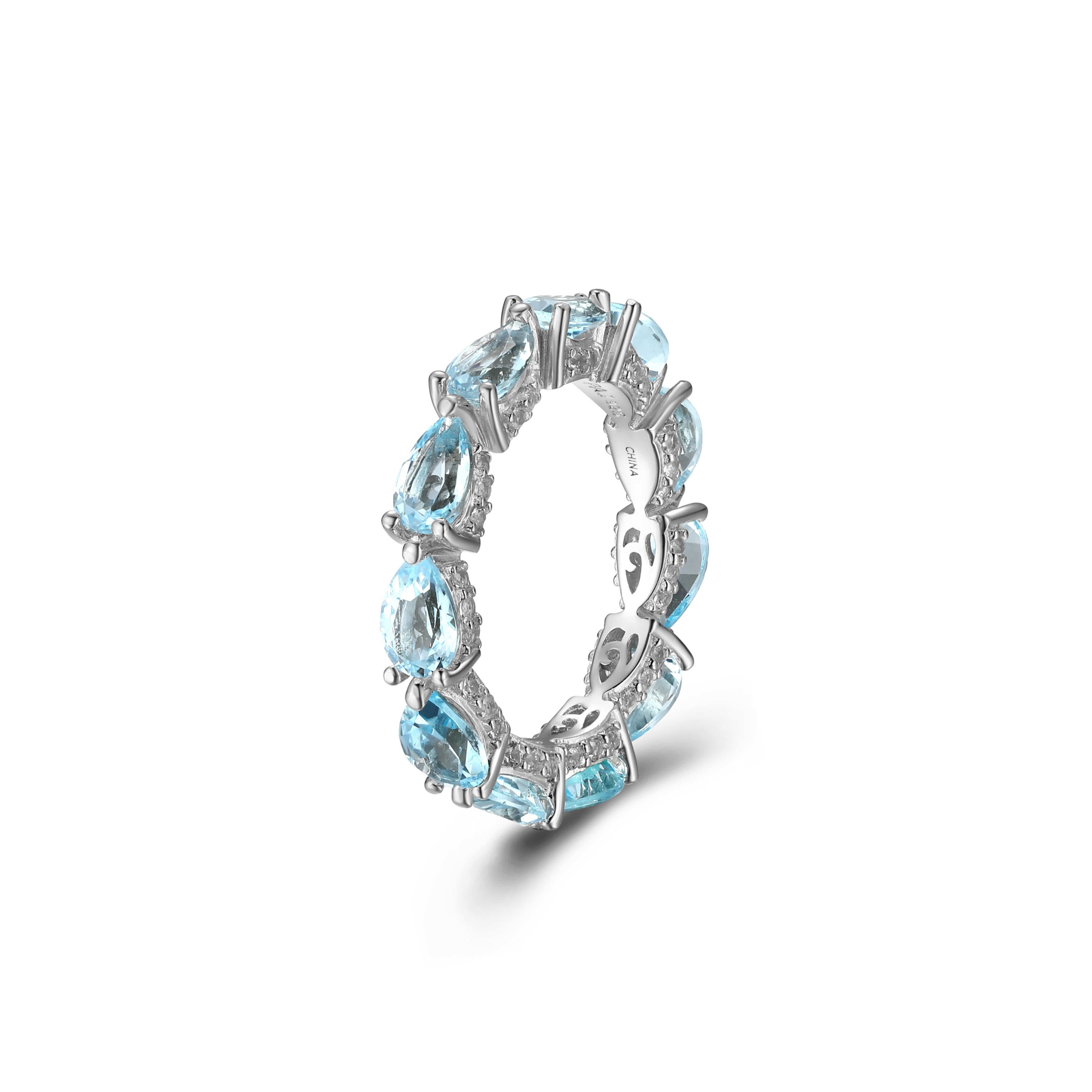 Rhodium Plated Sterling Silver Womens Genuine Blue Topaz and Created White Sapphire Eternity Ring
