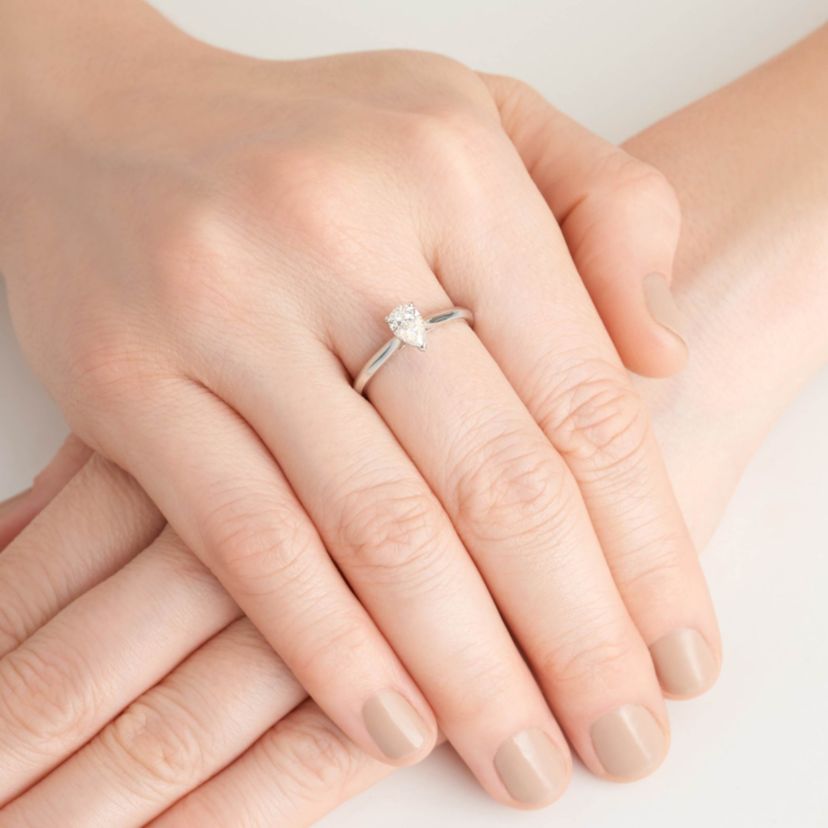 1/2 CT TW Lab Grown Diamond Pear Ring in Rhodium Plated Sterling Silver