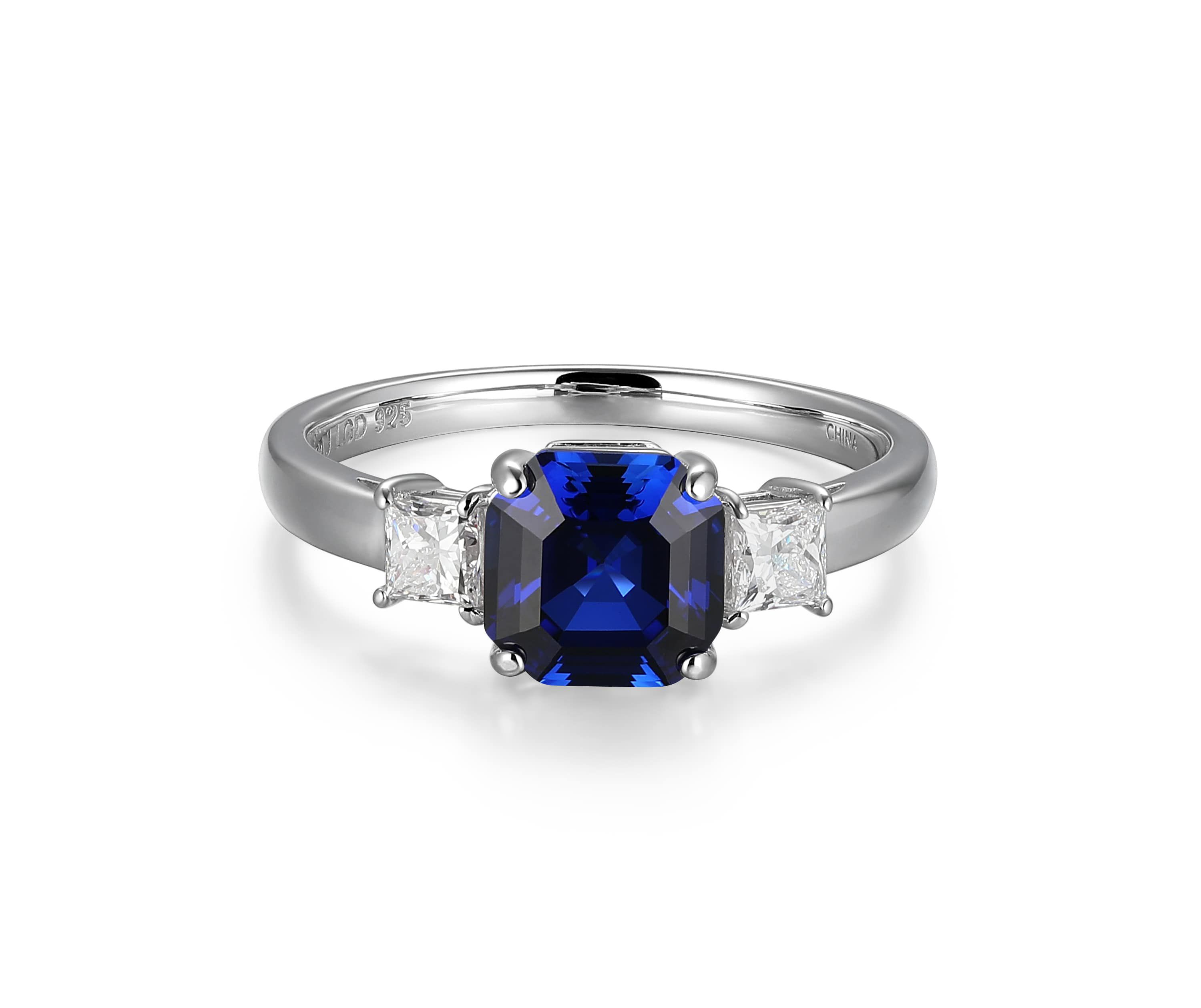 Rhodium Plated Sterling Silver Created Gemstone and 1/10 CTTW Lab Grown Diamond 3-Stone Ring