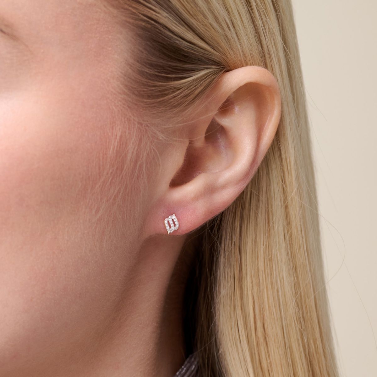 1/10 cttw Diamond Diagonal Swirl Stud Earrings in 14k Yellow Gold