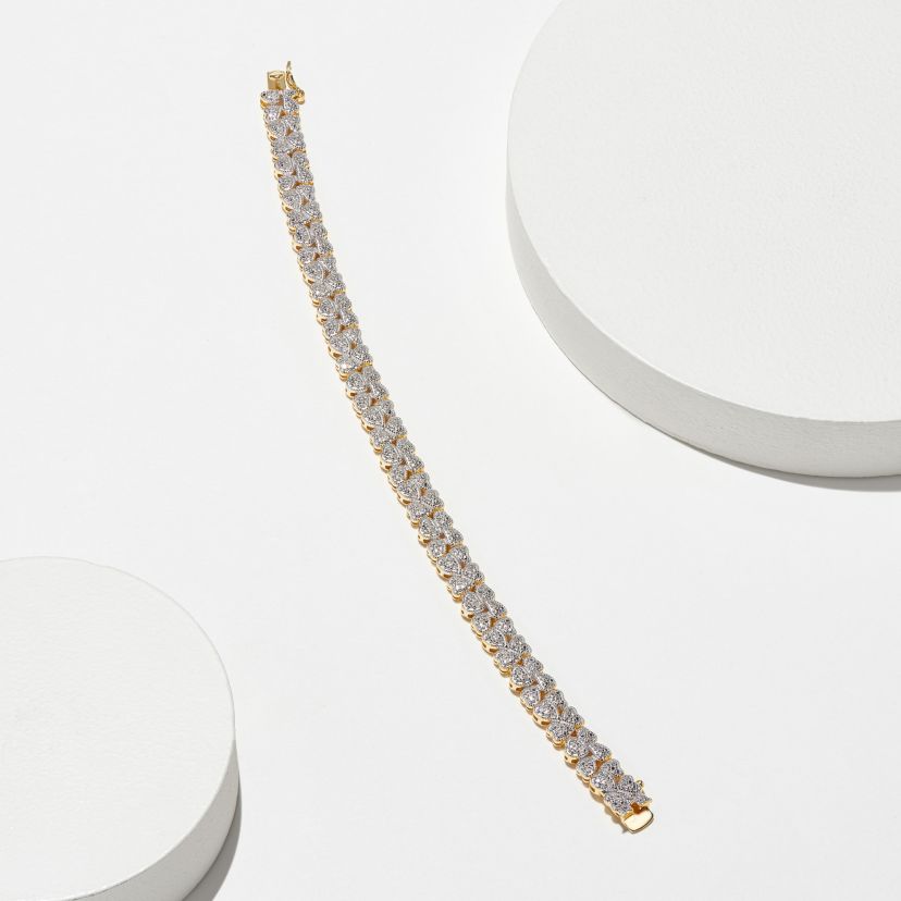 1/10 cttw Diamond Floral Station Tennis Bracelet in 18k Yellow Gold Plated Sterling Silver