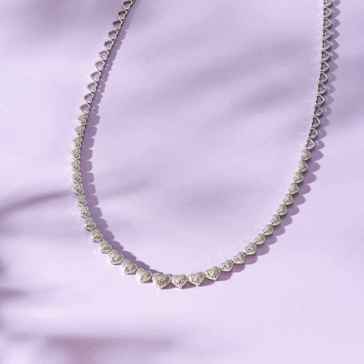 1/10 cttw Diamond Heart Tennis Necklace in Rhodium Plated Sterling Silver