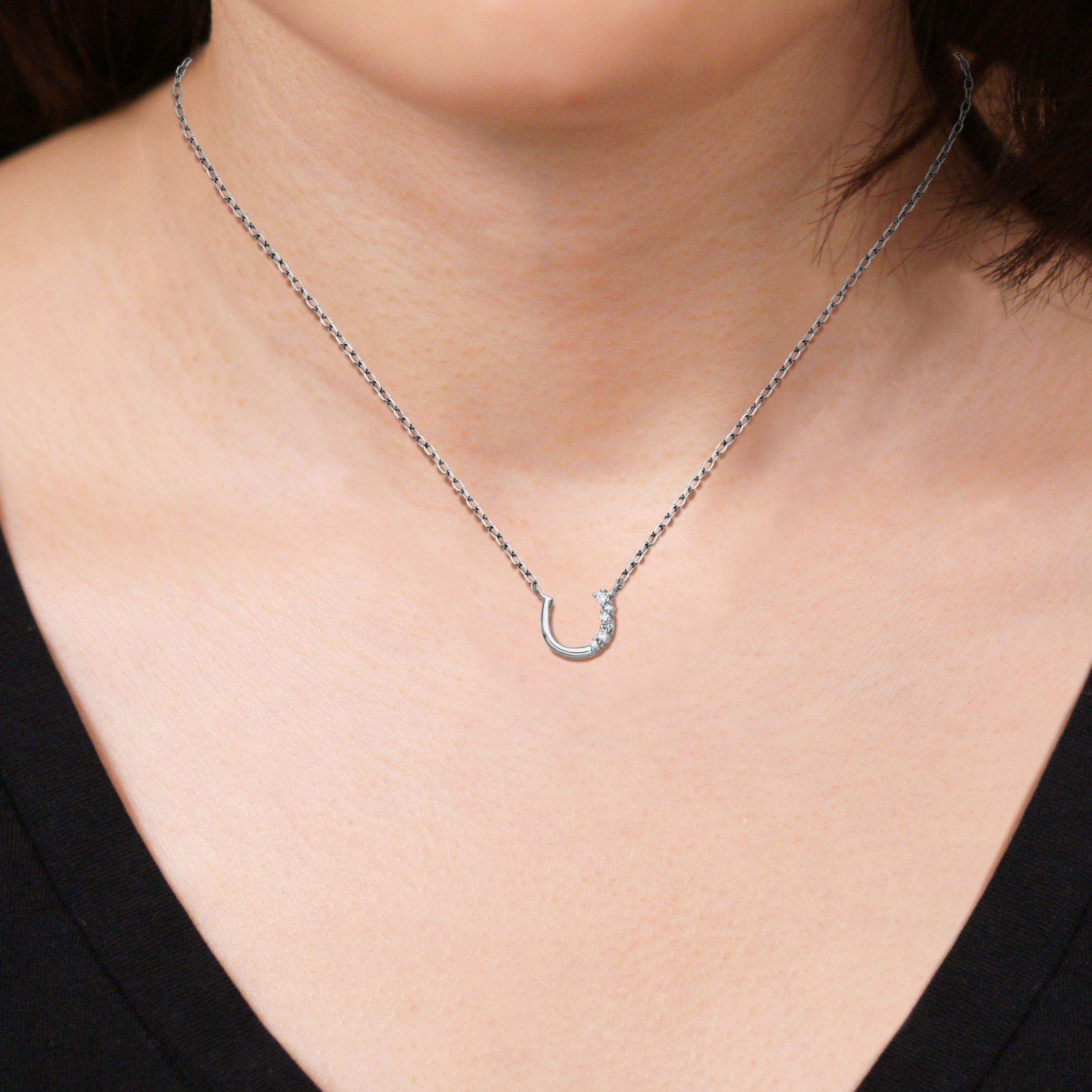 1/15 cttw Diamond Offset Horseshoe Necklace in Rhodium Plated Sterling Silver with 18" Chain