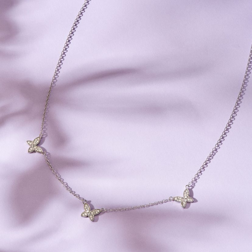1/5 cttw Diamond Floating Butterfly Station Necklace in Rhodium Plated Sterling Silver