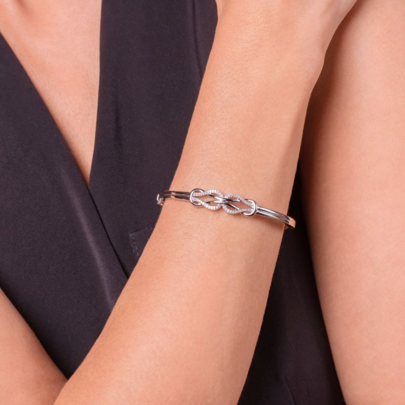 1/4 cttw Diamond Double Knot Bangle Bracelet in Rhodium Plated Sterling Silver