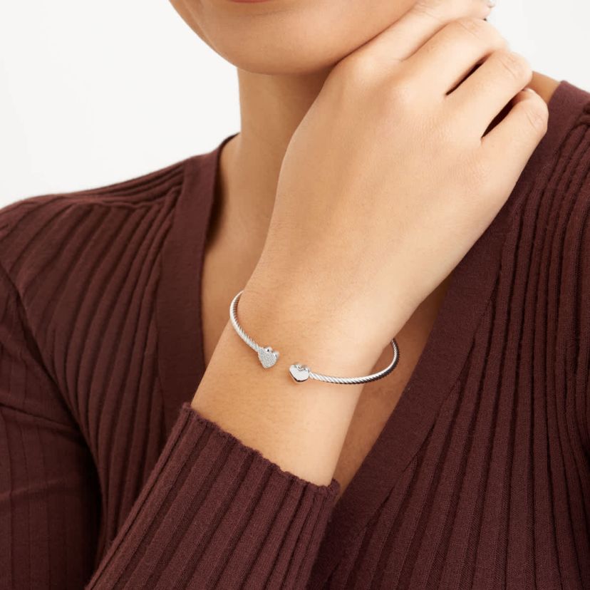 1/10 cttw Diamond Twin Heart Open Cuff Twisted Bangle in Rhodium Plated Sterling Silver