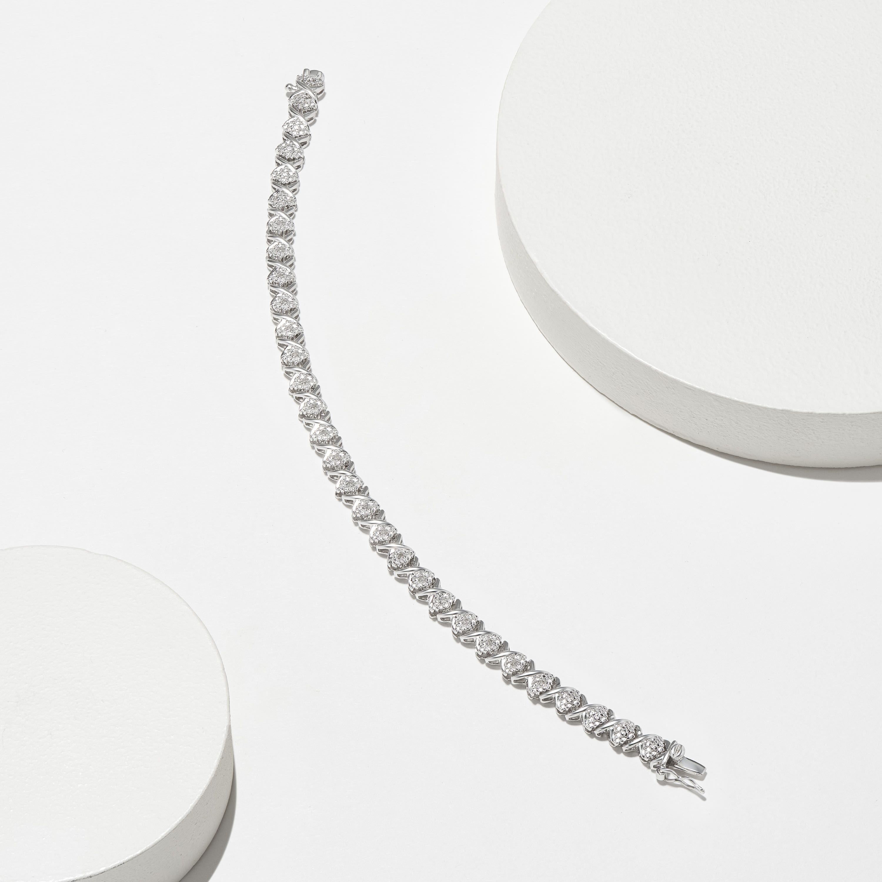 1/10cttw Diamond X Tennis Bracelet in Rhodium Plated Sterling Silver