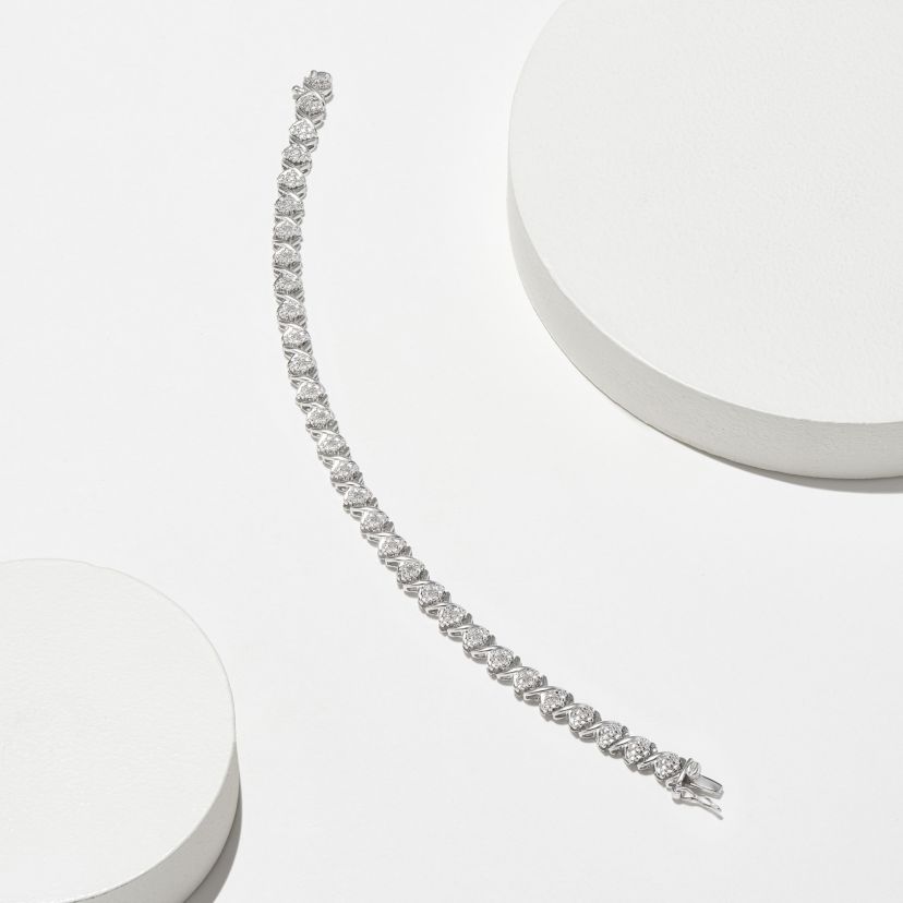 1/10cttw Diamond X Tennis Bracelet in Rhodium Plated Sterling Silver