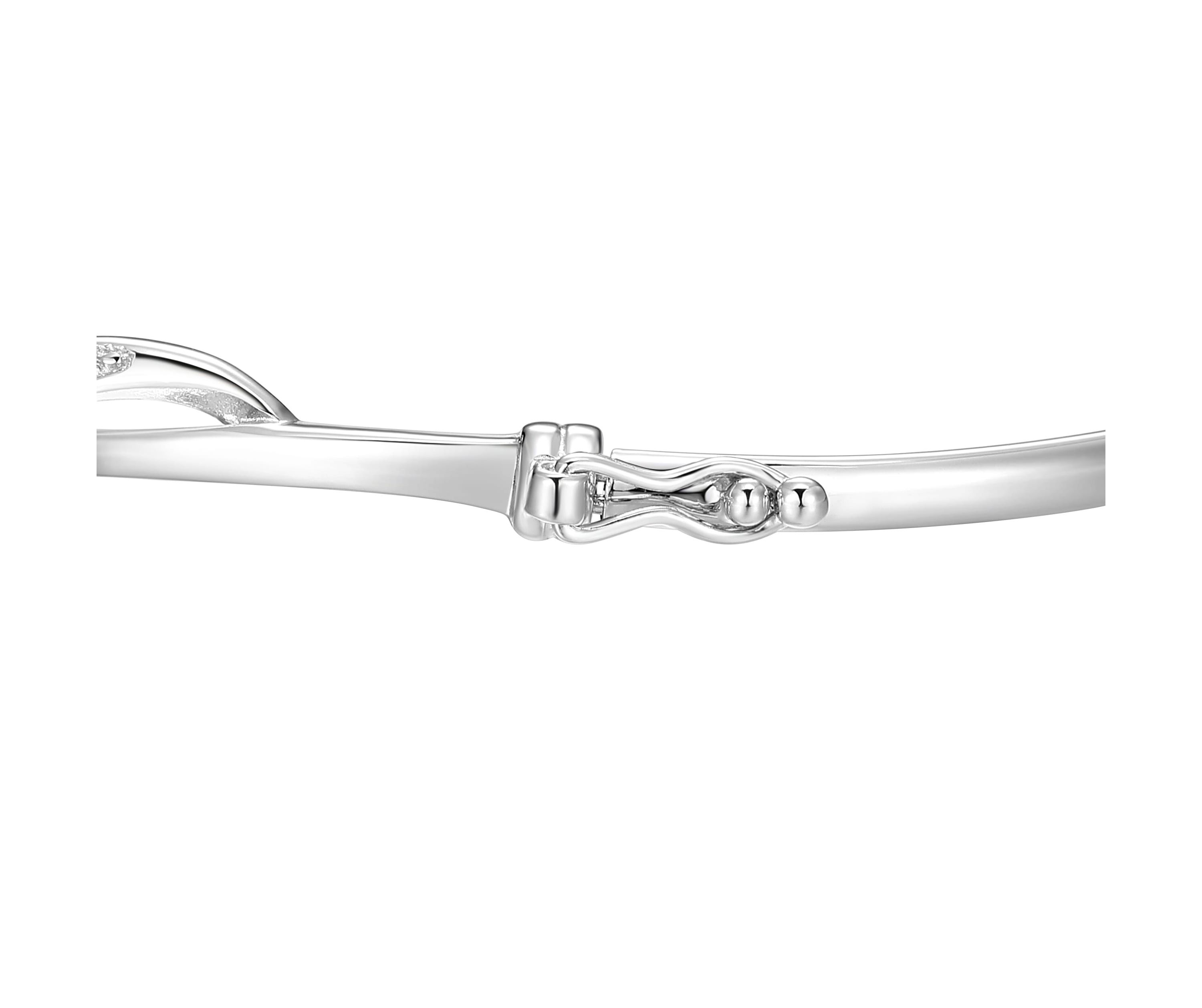 Diamond Accent Infinity Swirl Bangle Bracelet in Rhodium Plated Sterling Silver