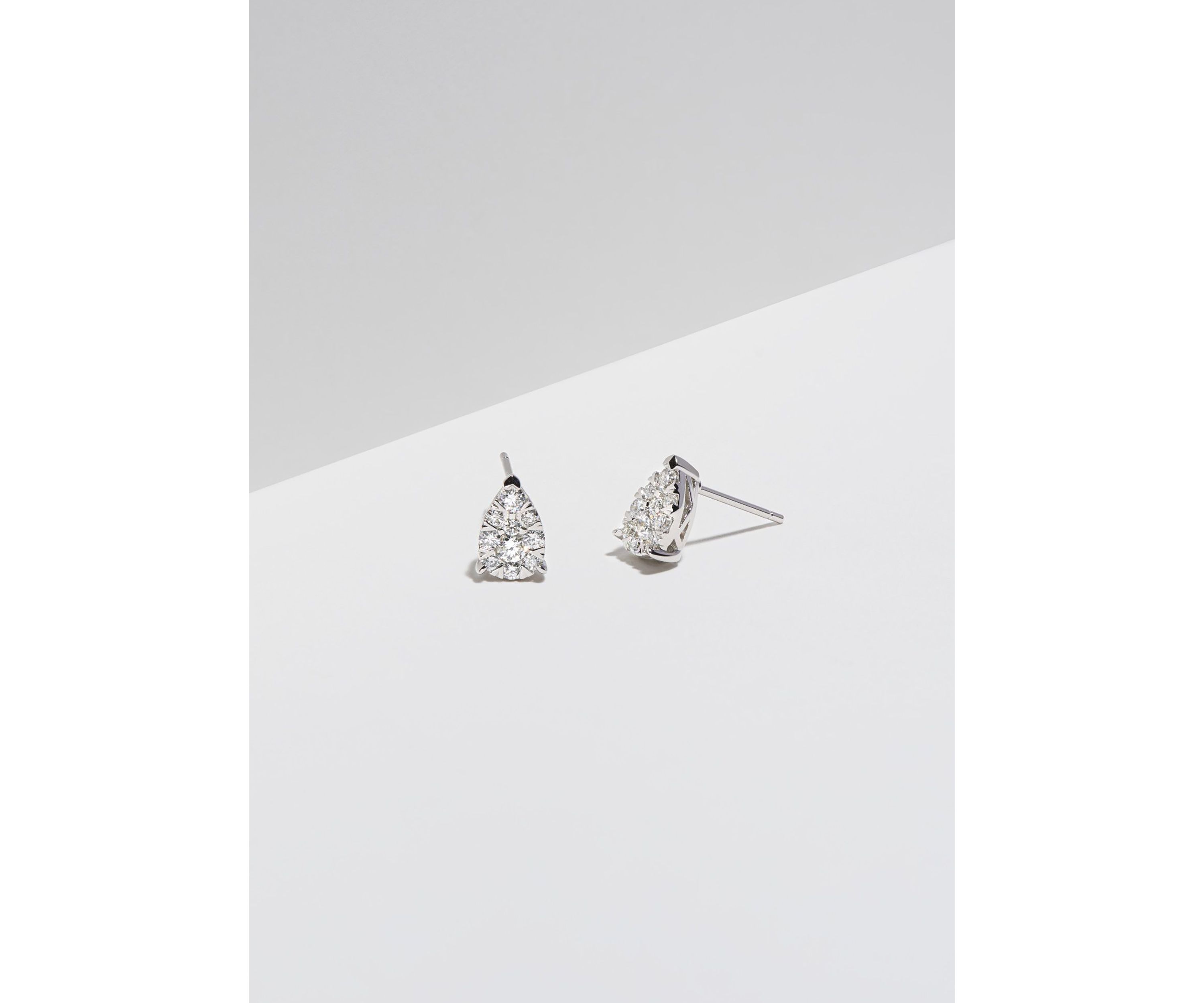 Lab Created Platinum Over Sterling Silver Pear Shape Earring Featuring 1/2 CT TW Lab Grown Diamond