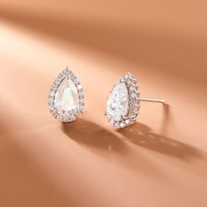 Pear Shaped Moissanite Earrings in 18k Gold or Rhodium Plated Sterling Silver