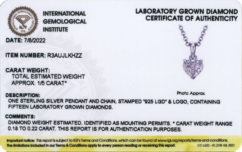 Lab Created Rhodium Over Sterling Silver Heart Pendant Featuring 1/5 CT TW Lab Grown Diamond