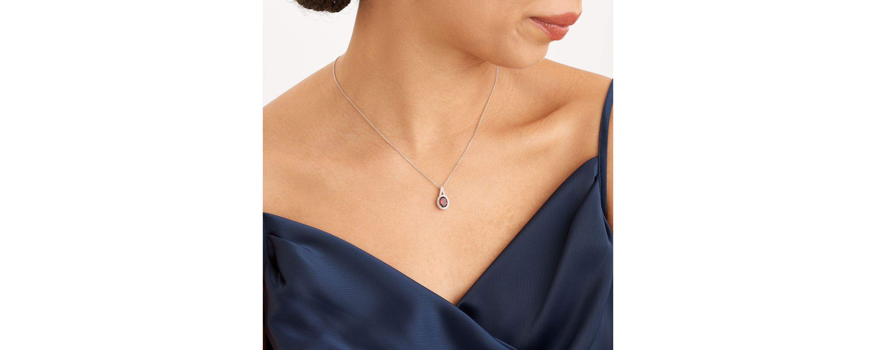 Genuine Garnet and Created White Sapphire Oval Halo Necklace and Earring Set in Sterling Silver
