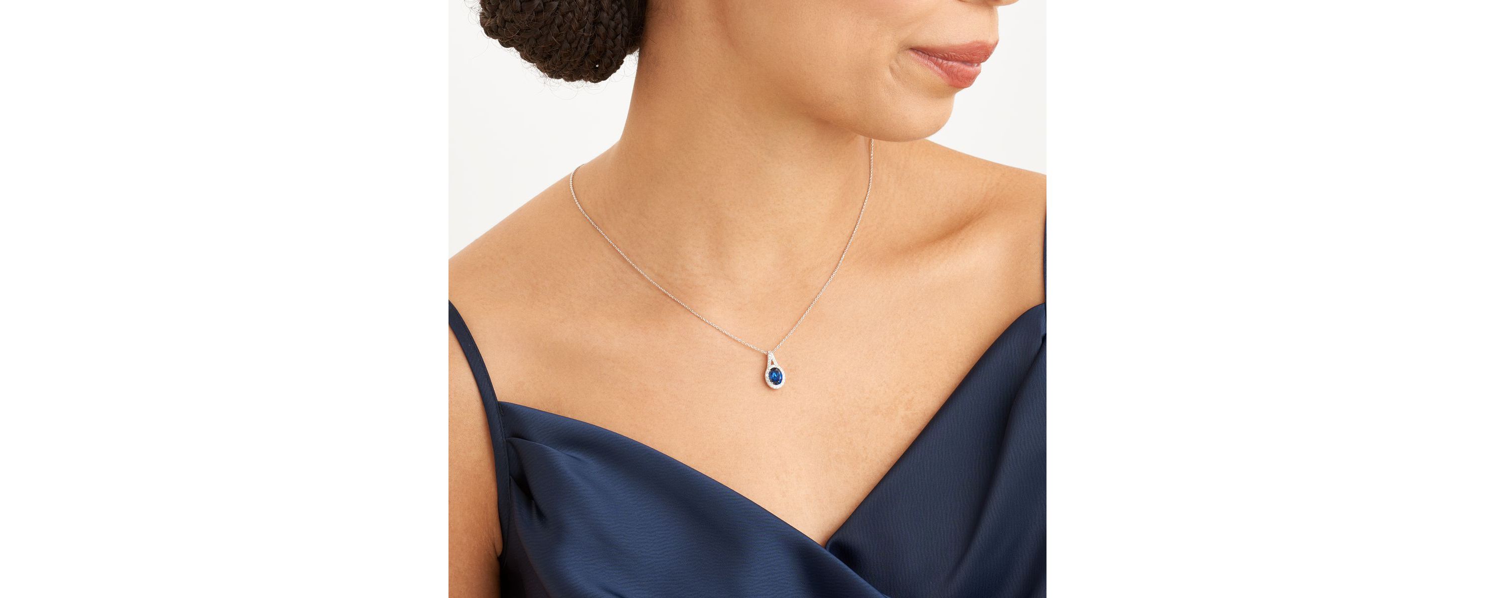 Created Blue and White Sapphire Oval Halo Necklace and Earring Set in Sterling Silver