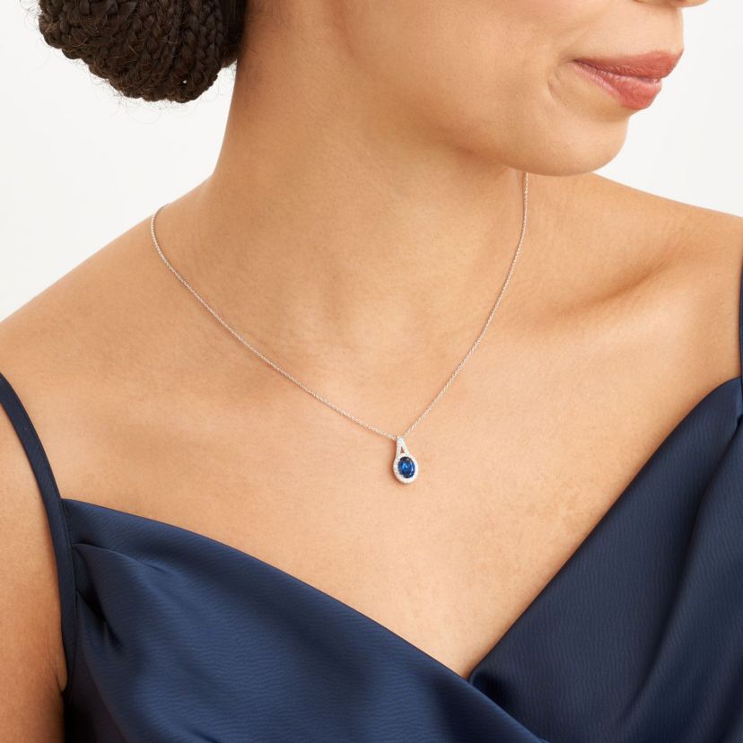 Created Blue and White Sapphire Oval Halo Necklace and Earring Set in Sterling Silver