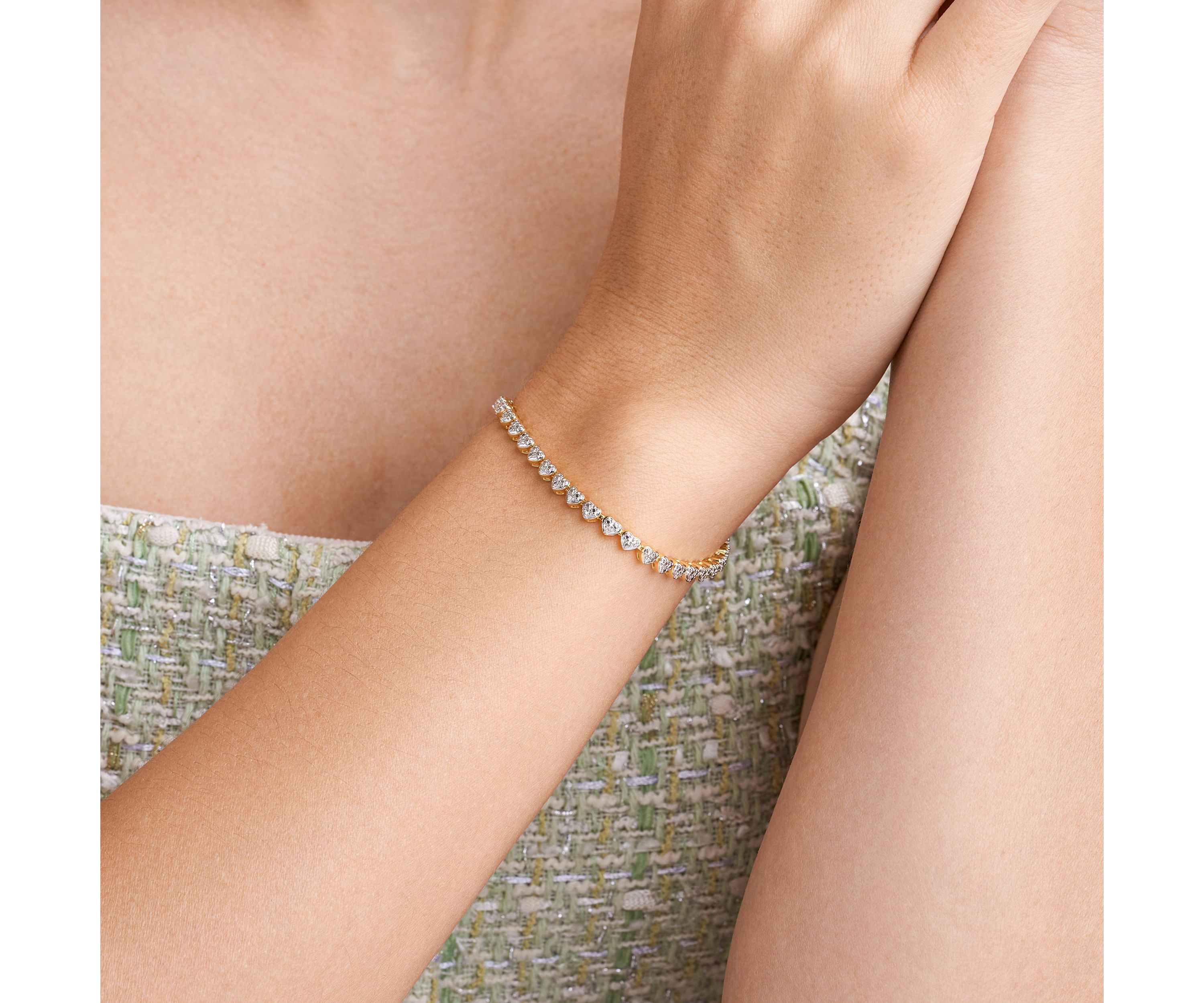 1/10 cttw Diamond Heart Tennis Bracelet in 18k Yellow Gold Plated Sterling Silver